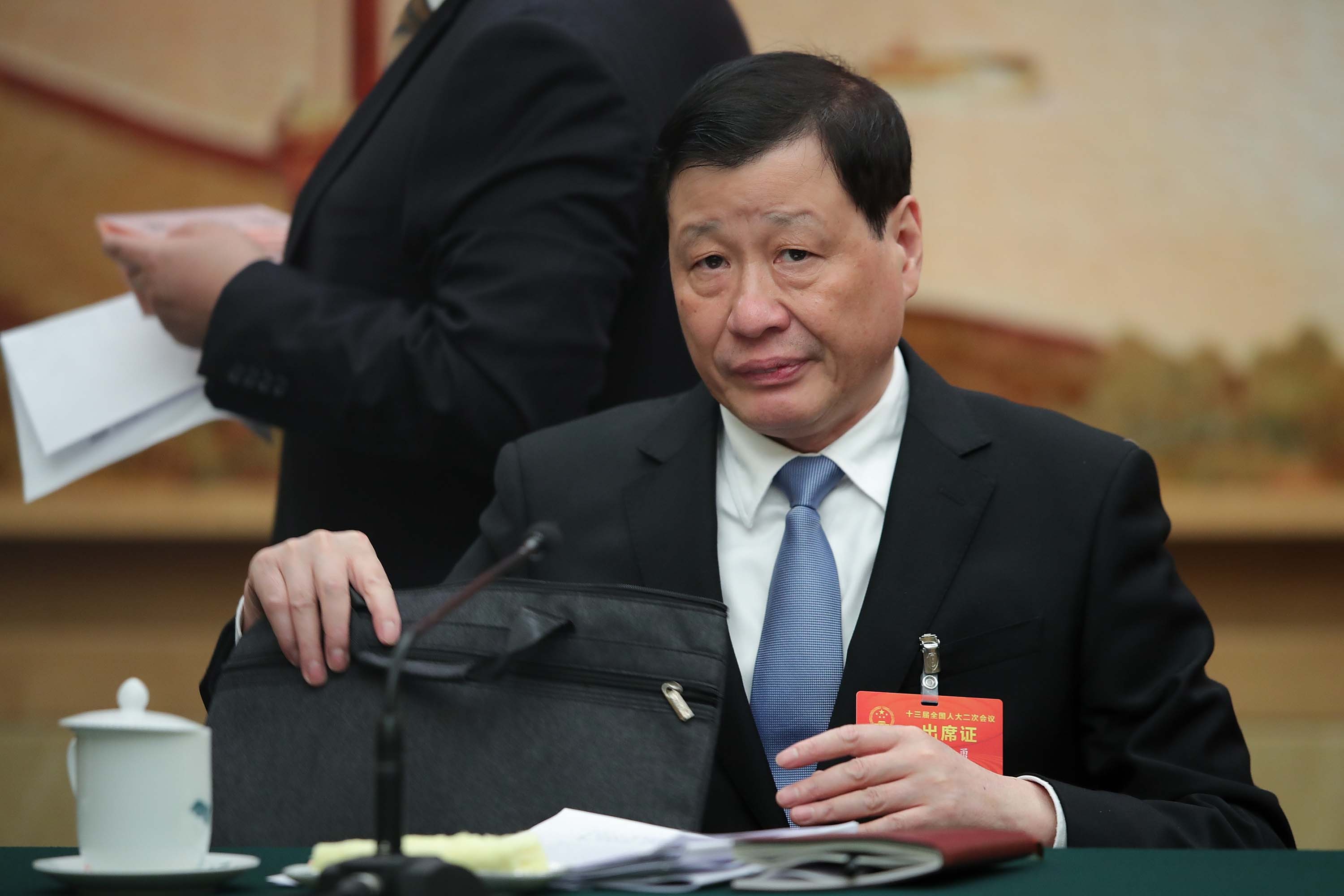 Shanghai Mayor Ying Yong attends a meeting during the annual National People's Congress in Beijing, in March 2019. 