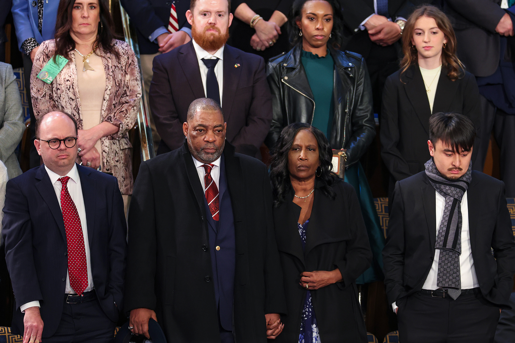 Rodney Wells and RowVaughn Wells, parents of Tyre Nichols, and Brandon Tsay, hero of the Monterey, California, shooting, wait for the start of President Joe Biden's State of the Union address.