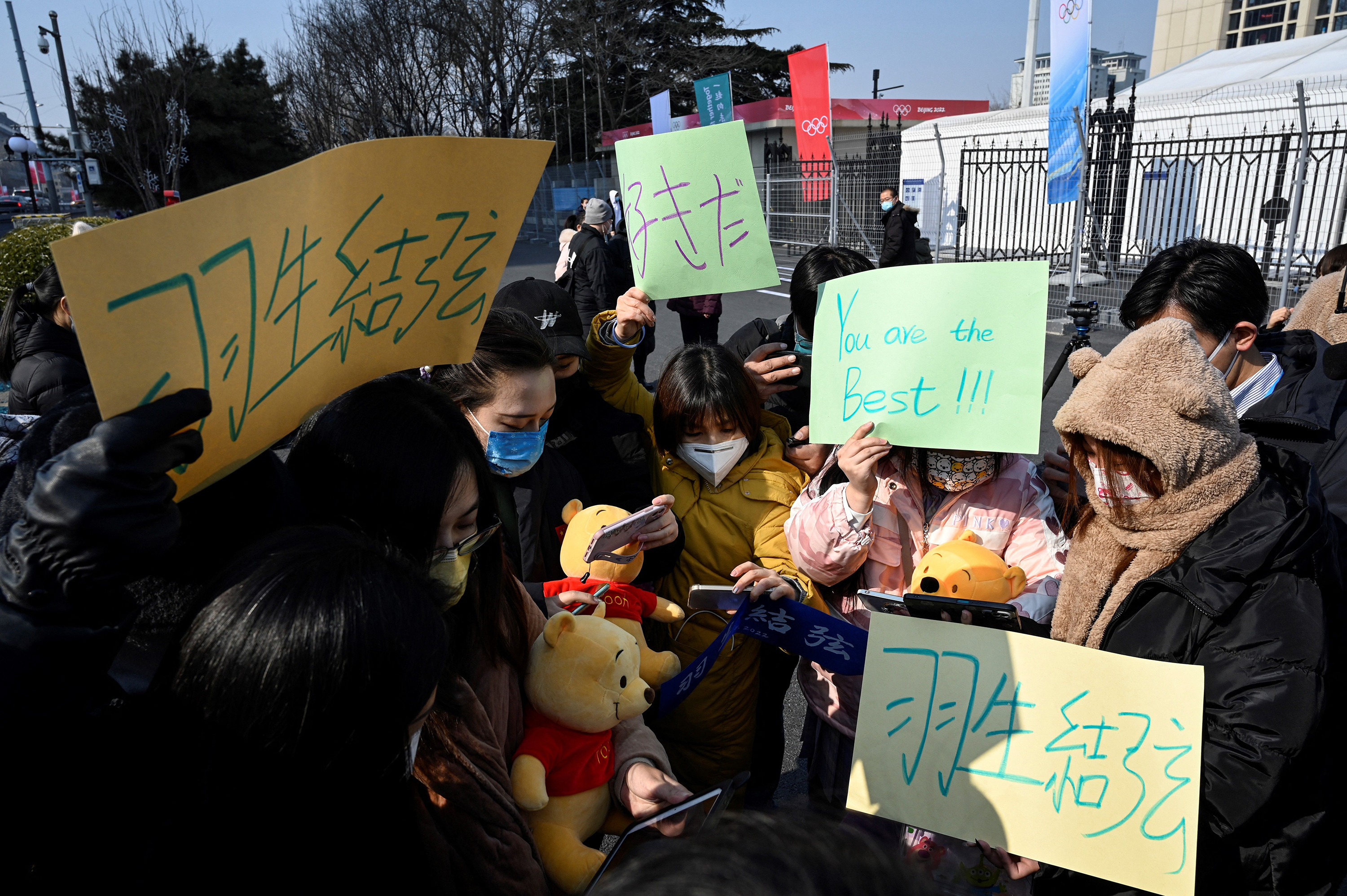 Supporters of Japanese figure skater Yuzuru Hanyu gather in Beijing on Thursday.
