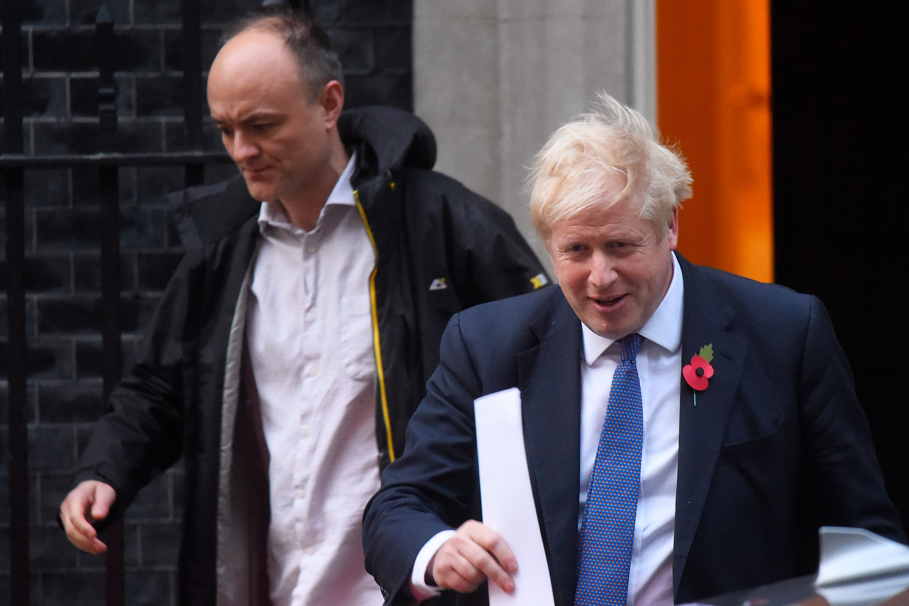 British Prime Minister Boris Johnson and Dominic Cummings leave 10 Downing Street on October 28.