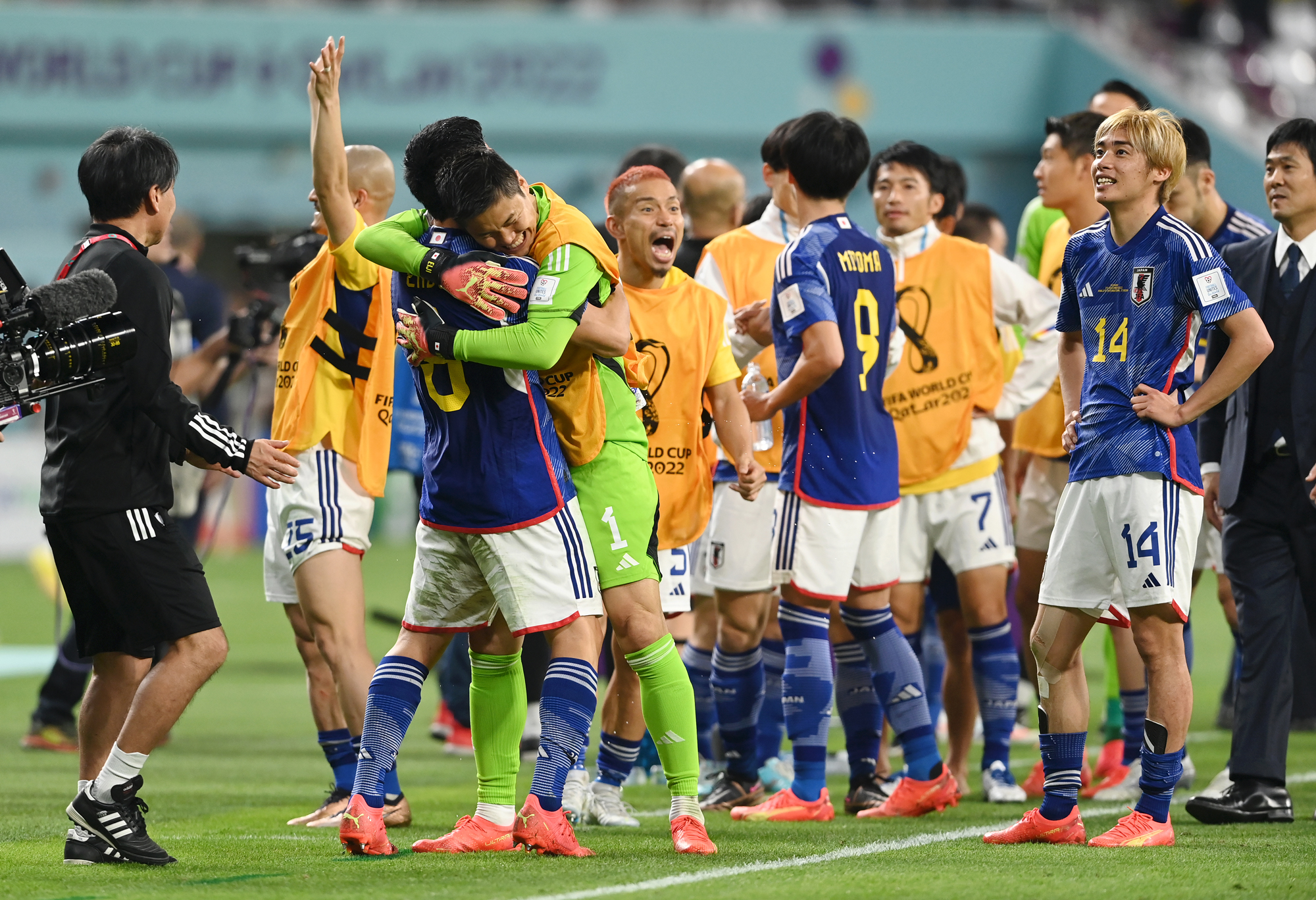 Japan players celebrate the 2-1 win against Germany at Khalifa International Stadium in Doha, Qatar on Wednesday.