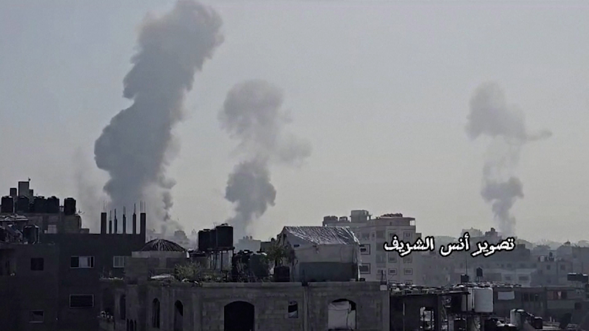 In this still from video obtained by Reuters, smoke fills the air in Jabalya, Gaza, on Sunday, December 3.