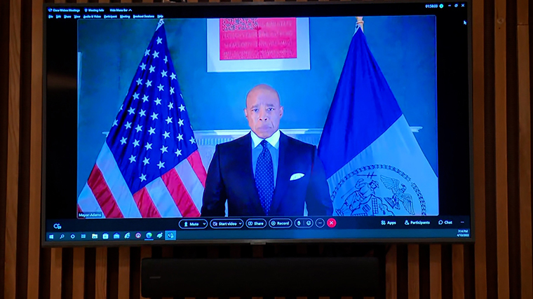 Adams addressed the news conference via video.
