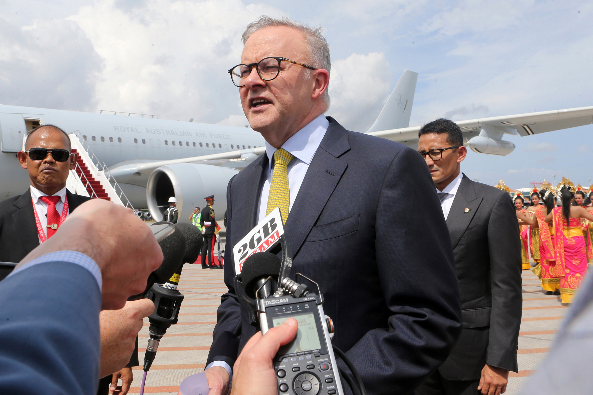 Australian Prime Minister Anthony Albanese talks to the media upon arrival at Ngurah Rai International Airport ahead of the G20 Summit in Bali, Indonesia, on Monday.