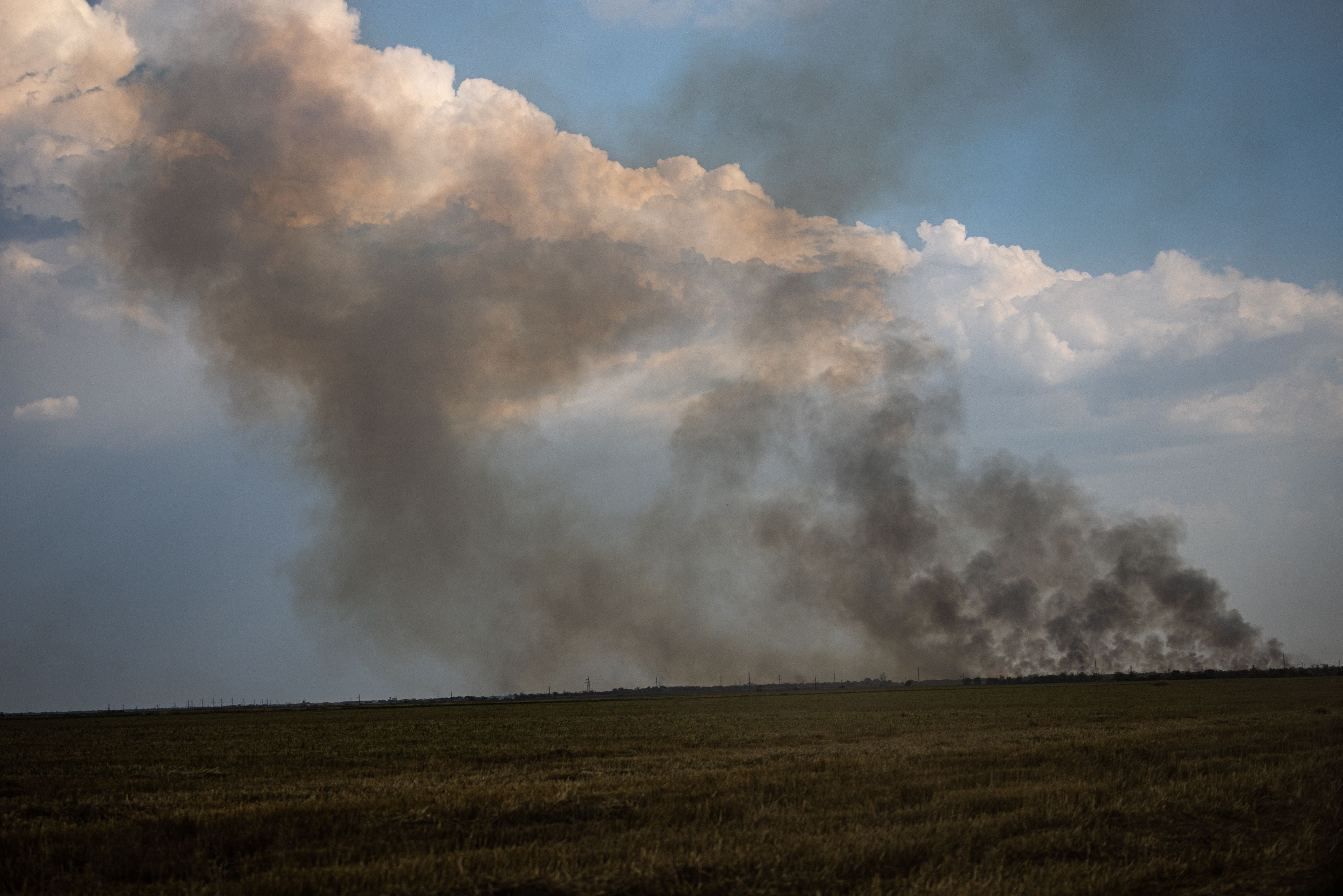 Black smoke rises at the front line in Mykolaiv Oblast in southern Ukraine on August 30. 
