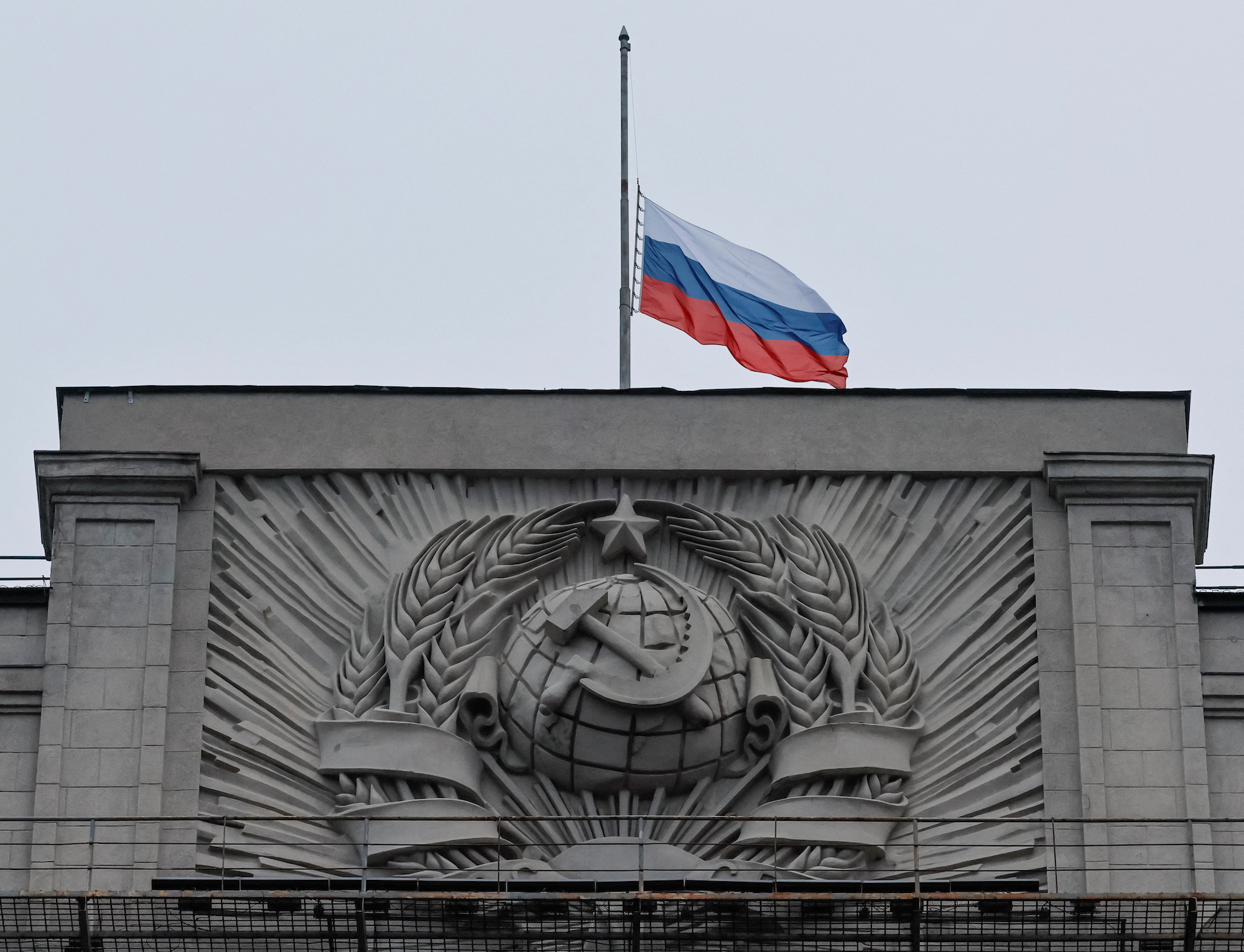 A Russian national flag is seen lowered on the headquarters of State Duma in Moscow on Sunday.