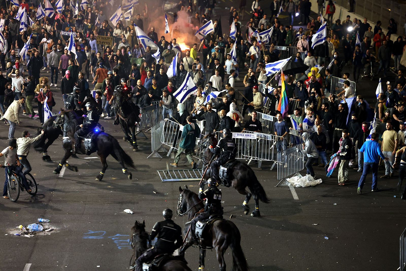 Protesters clash with police during a rally against the Israeli government's judicial reform in Tel Aviv on Monday.