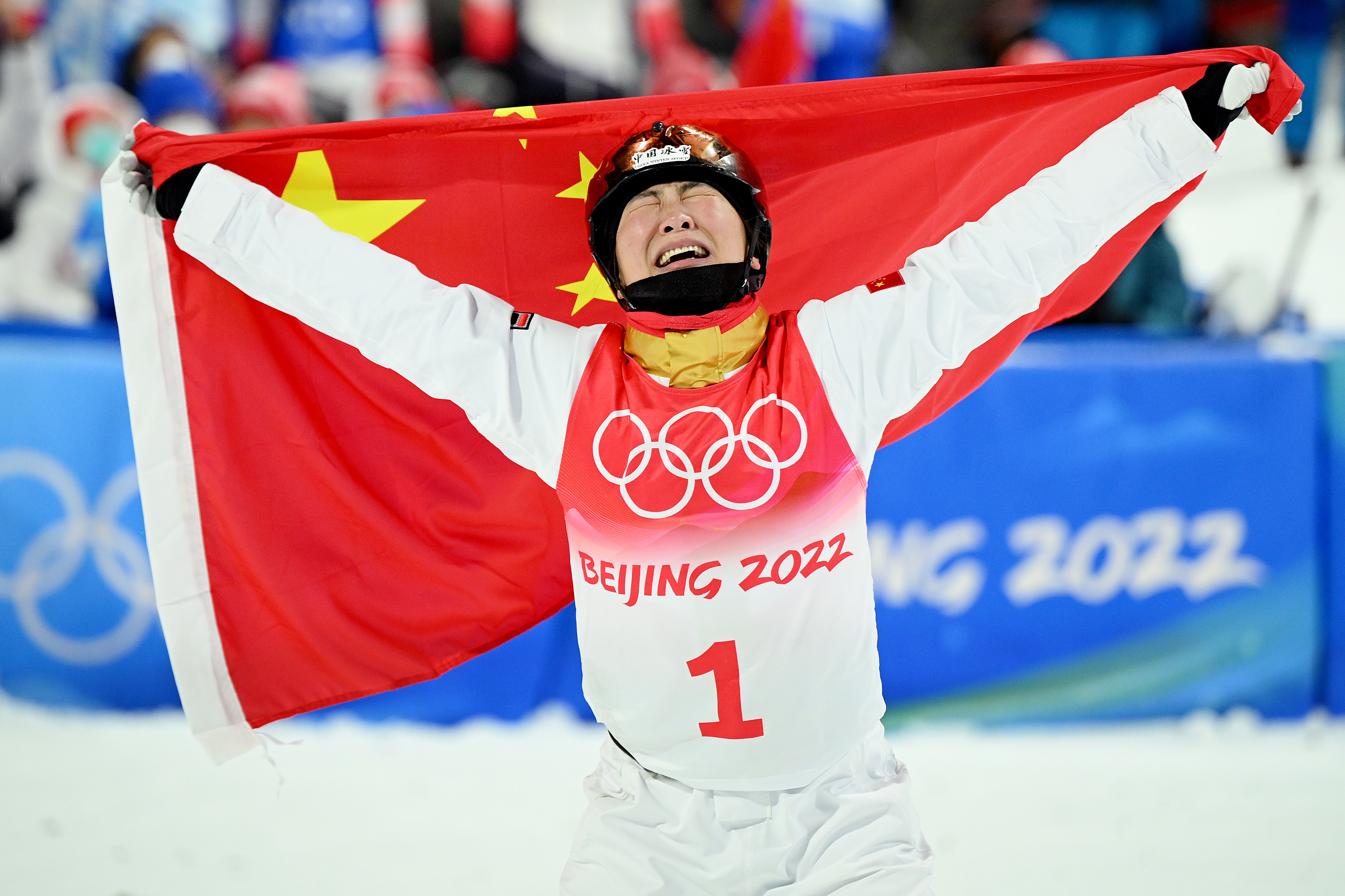 China's Xu Mengtao reacts to winning the gold medal during the women's freestyle skiing aerials final at Genting Snow Park on February 14.