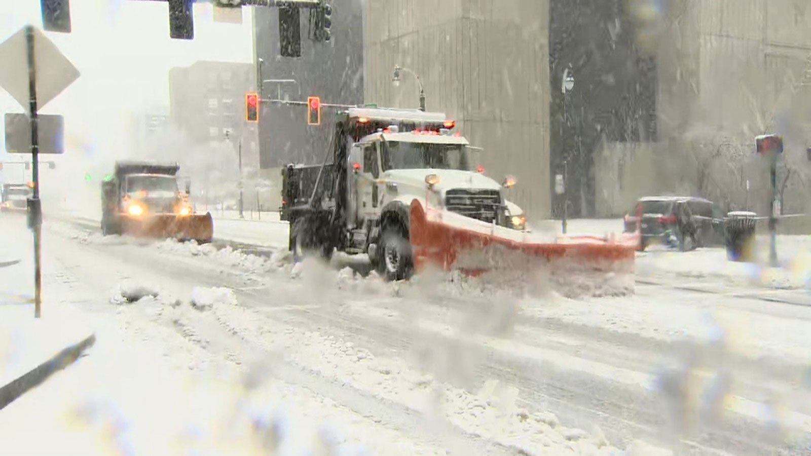 Trucks plow snow in Worcester, Massachusetts, Tuesday morning. 