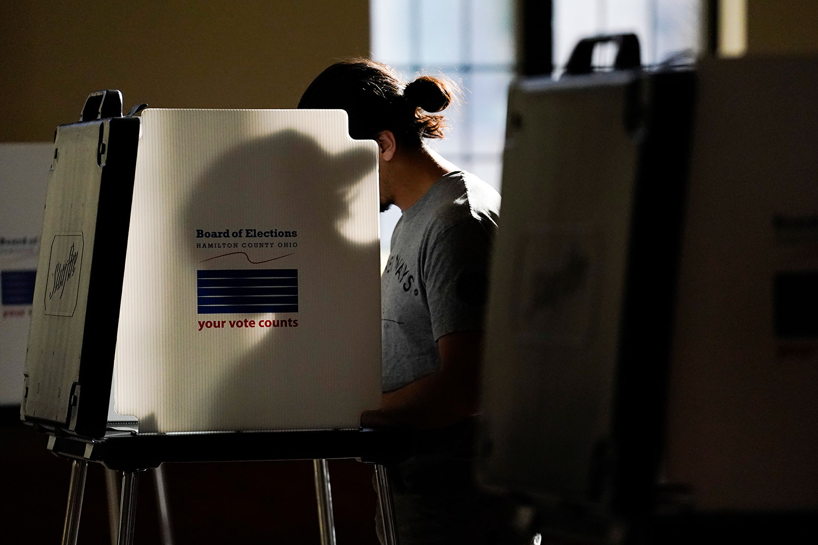 A person votes at the Knox Presbyterian Church in Cincinnati.