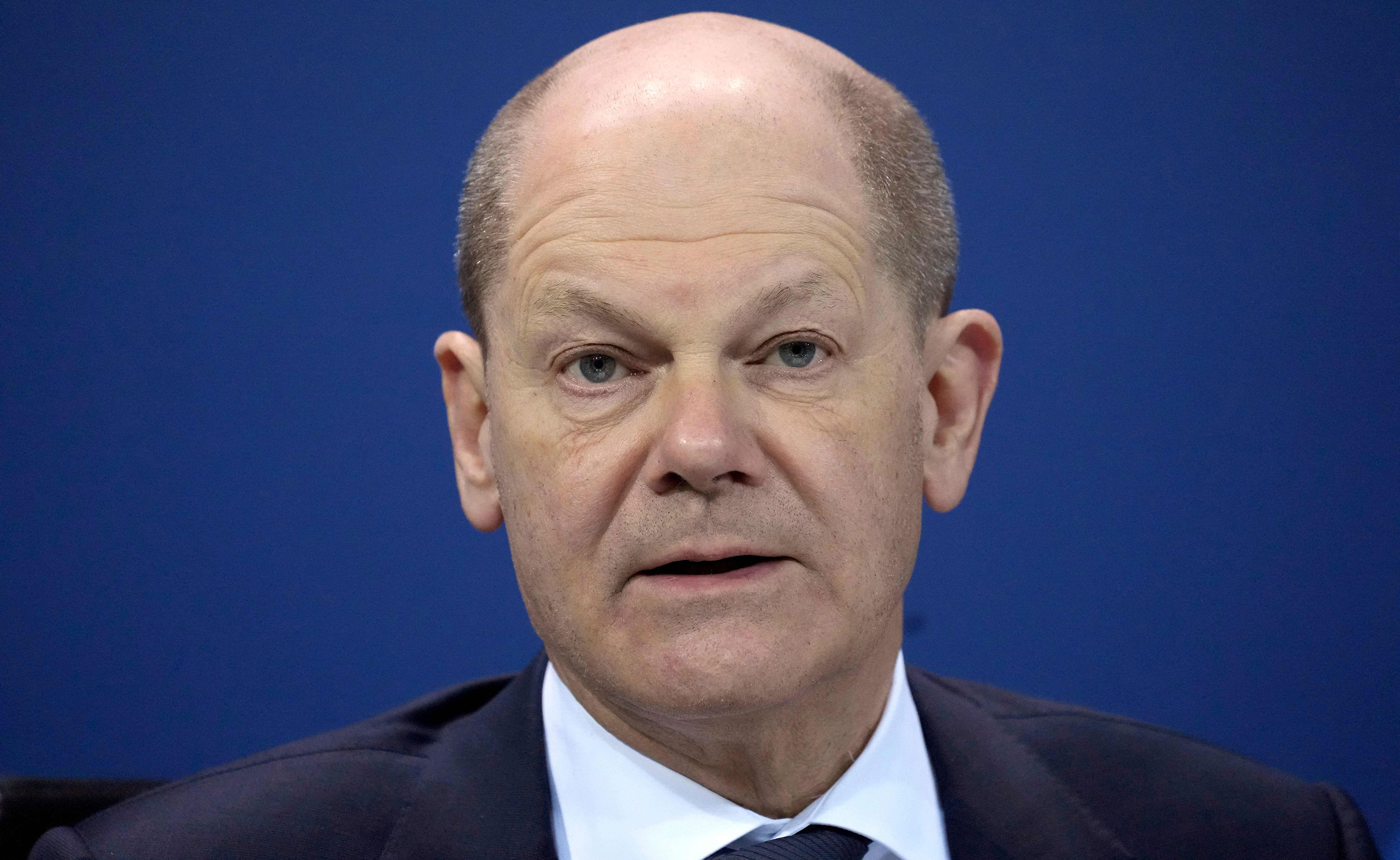 German Chancellor Olaf Scholz arrives for a press conference in Berlin on Thursday.