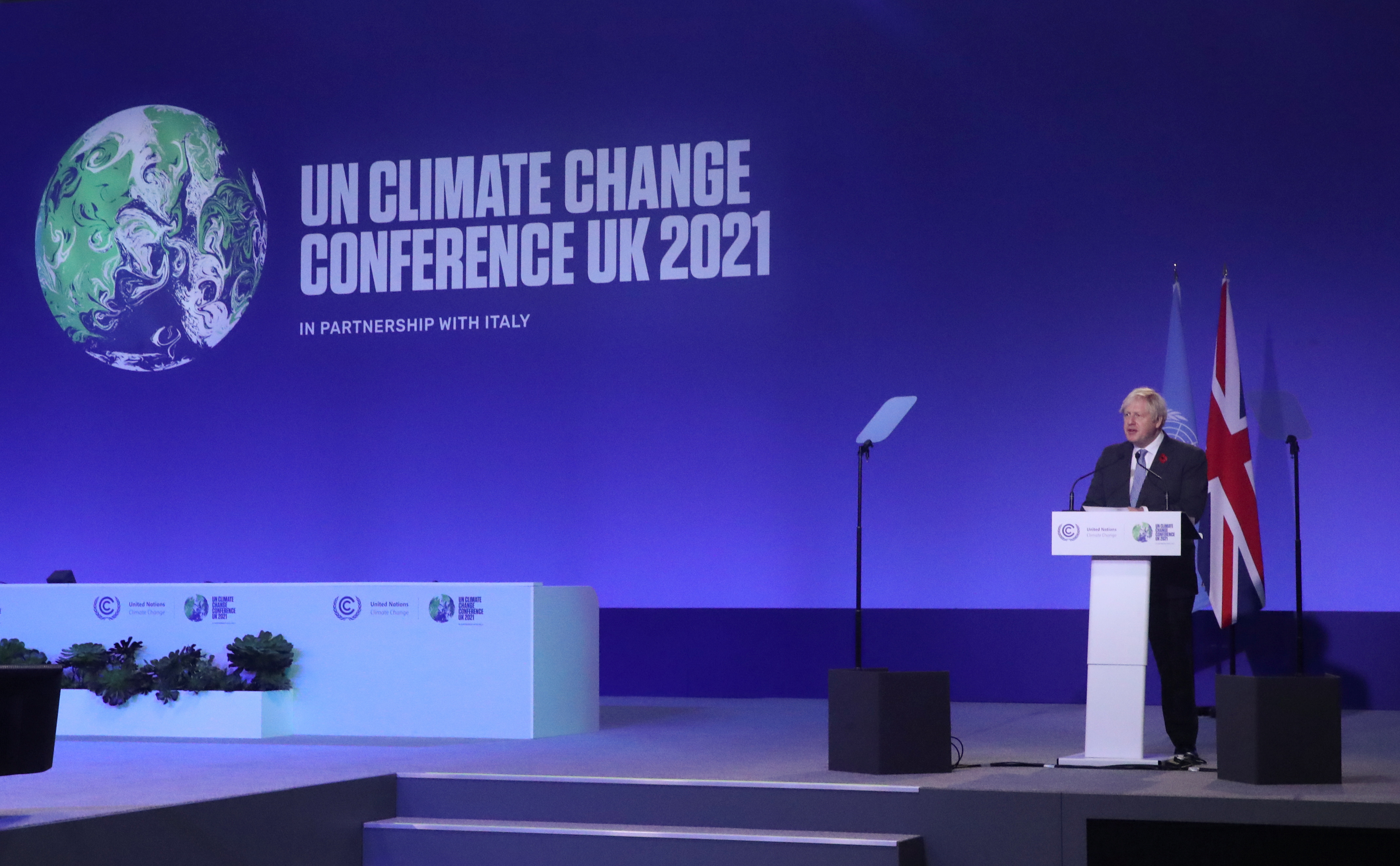 British Prime Minister Boris Johnson speaks during the opening ceremony of the UN Climate Change Conference Monday.