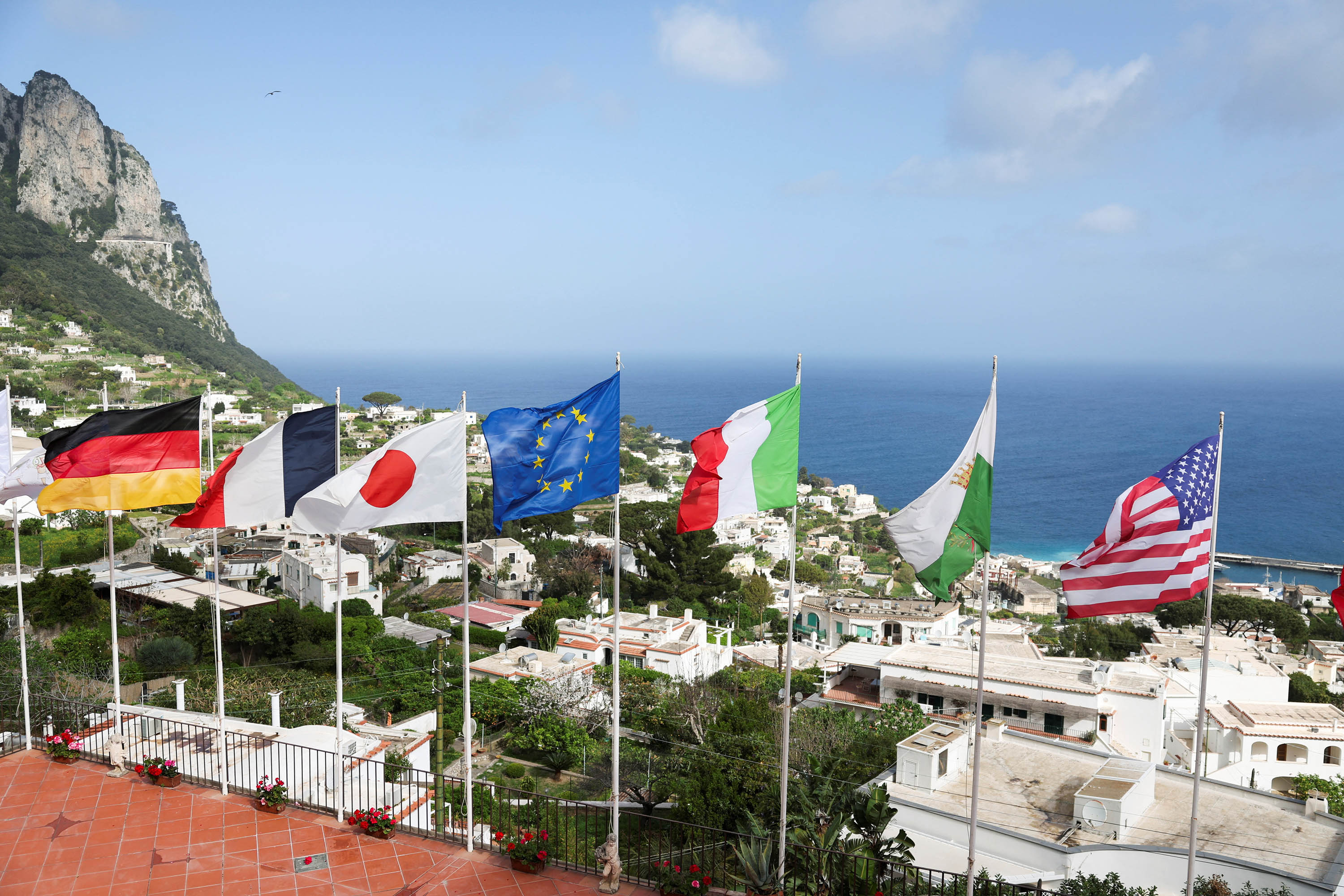 Flags blow in the wind ahead of the G7 Foreign Ministers summit in Capri, Italy, on April 17. 