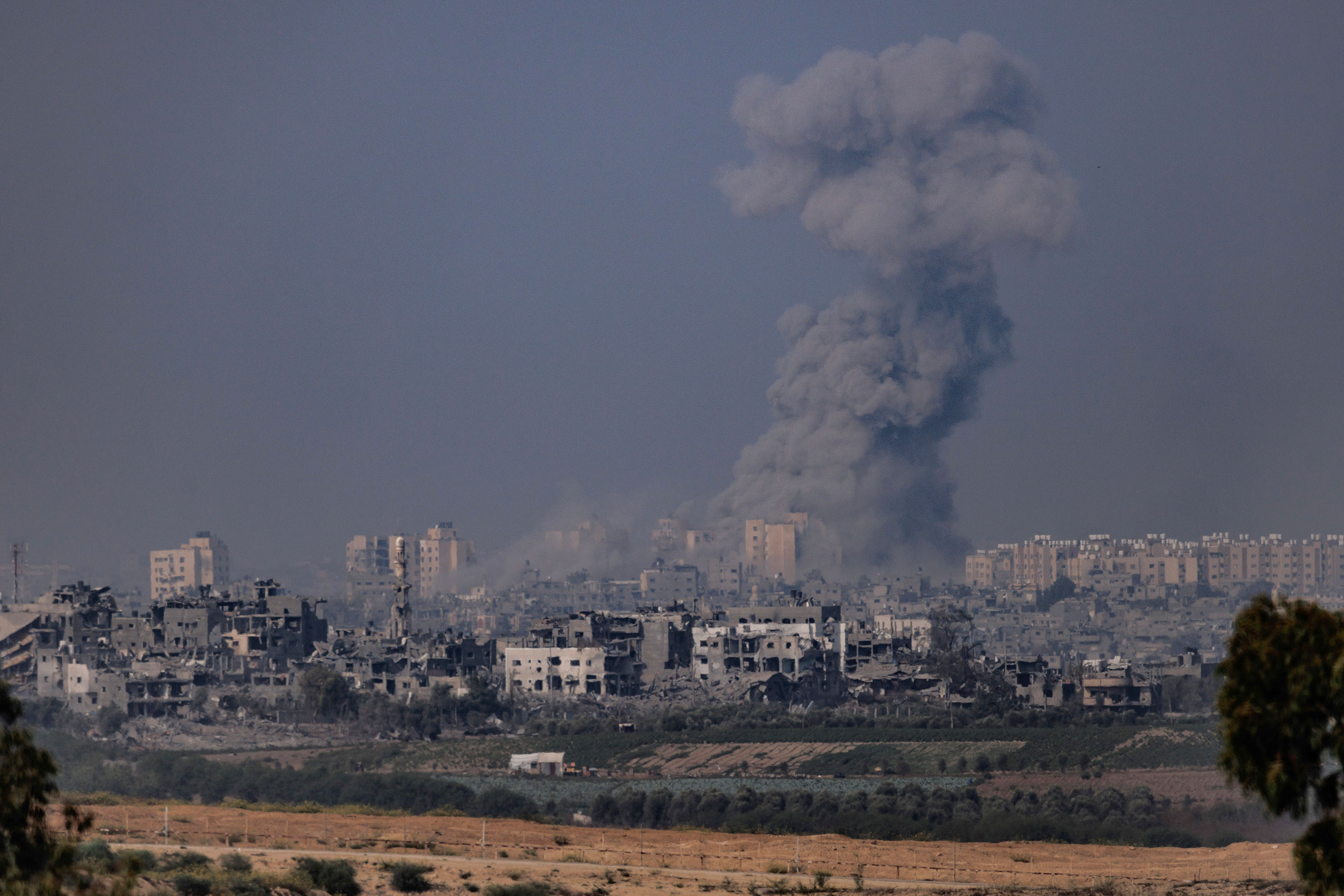 Smoke rises from an explosion in Gaza, as seen from Sderot, Israel, on October 28. 