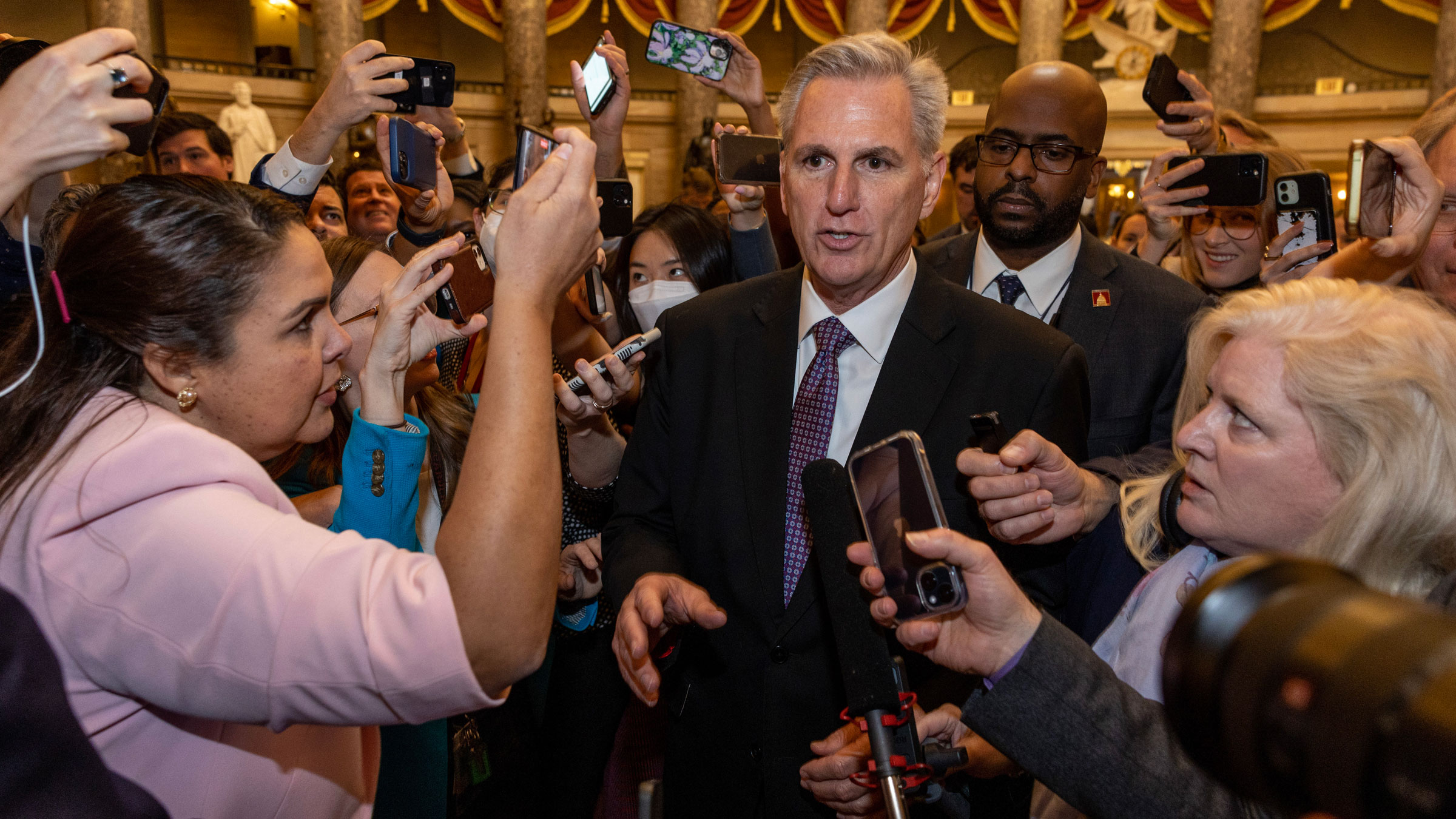 Kevin McCarthy speaks to the media as he heads to the House chamber on Wednesday.