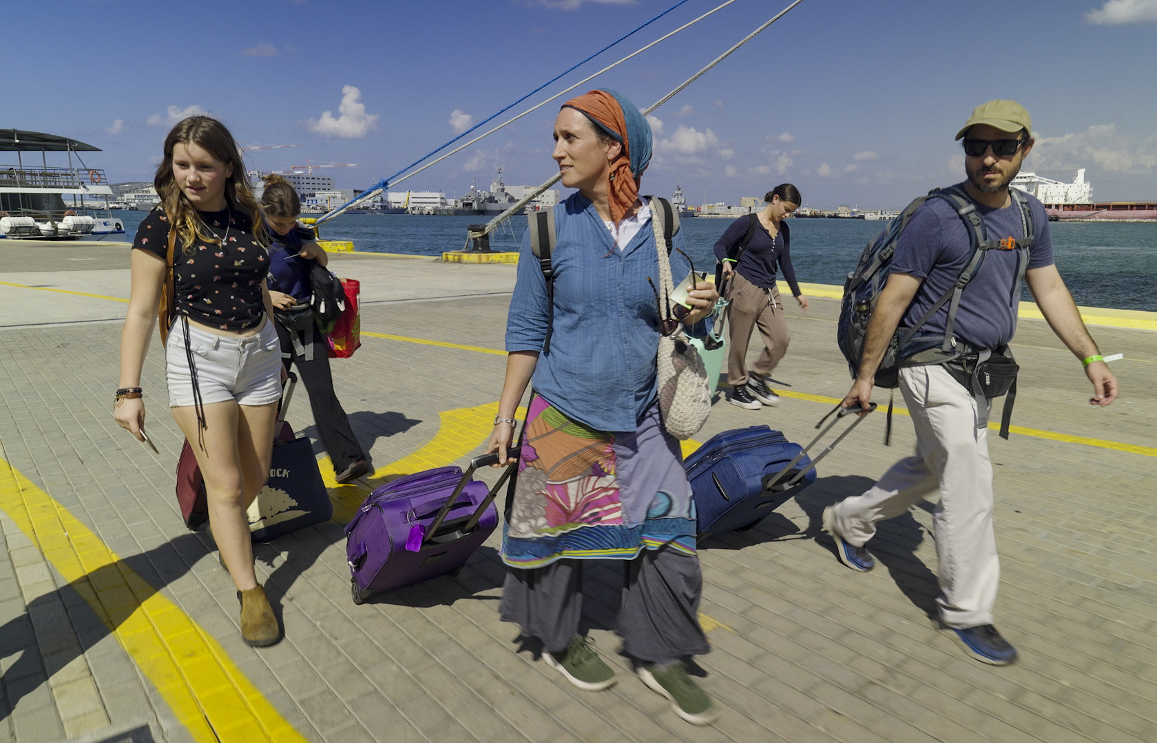 Sarah, center, and her daugther, Ariella, left, at Haifa port on their way to Cyprus.