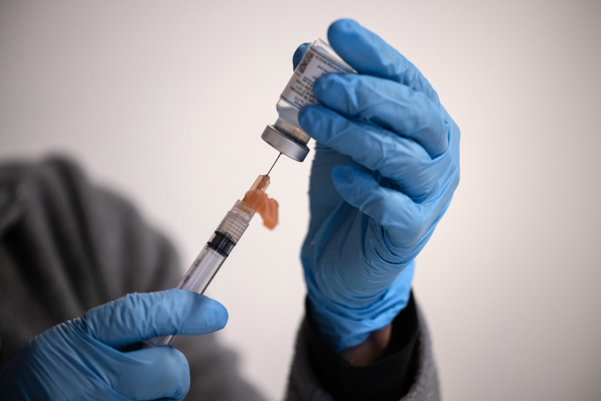 A dose of the Moderna COVID-19 vaccine is prepared on March 14 in Stamford, Connecticut. 