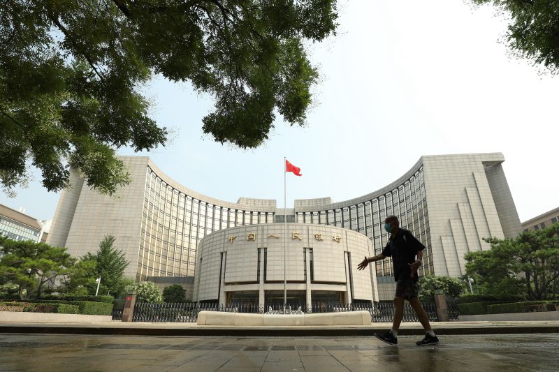 A man walks past the People's Bank of China building on July 20, 2022 in Beijing, China. 