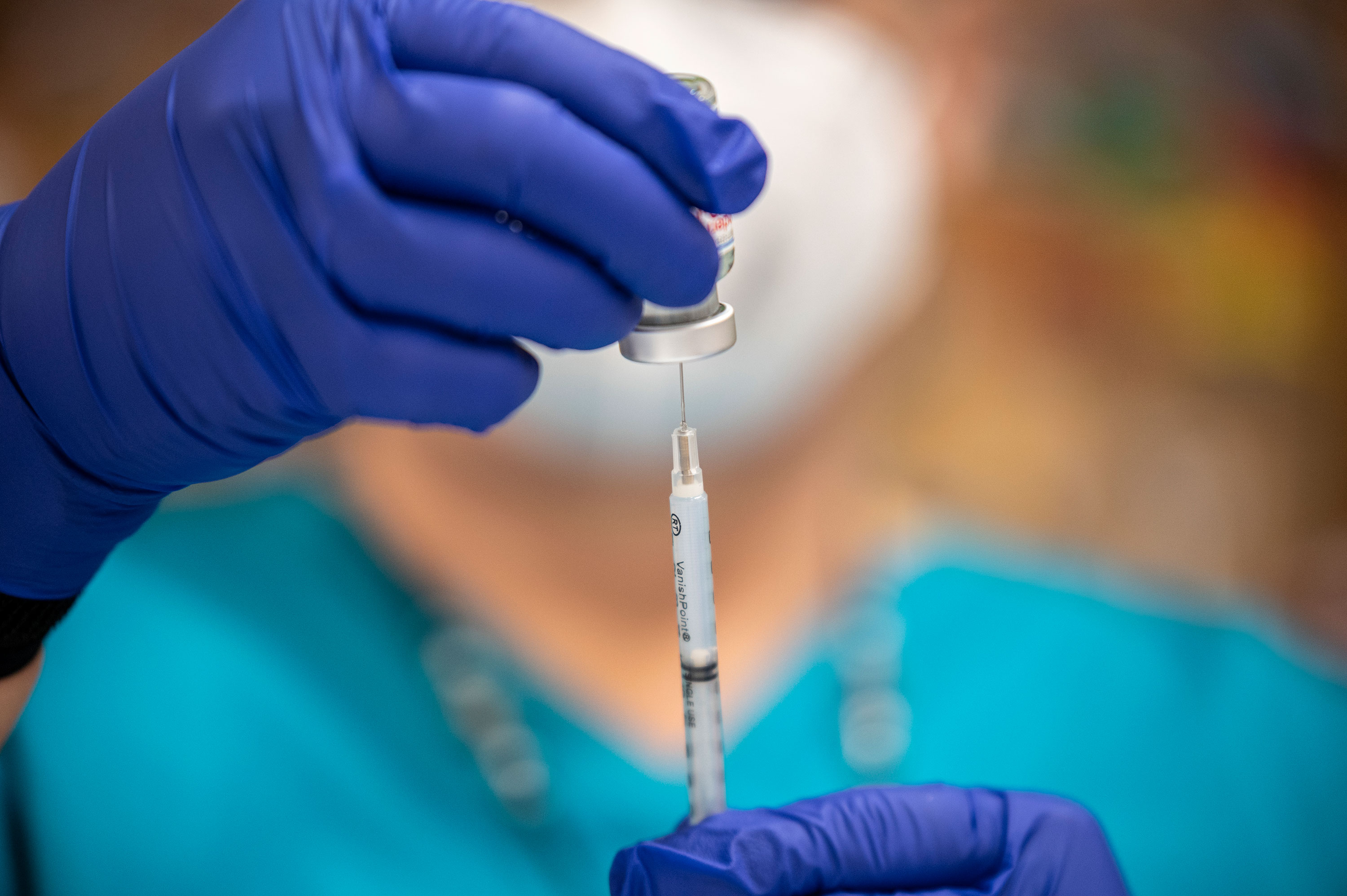 A nurse fills a syringe with the Moderna Covid-19 vaccine at a vaccination site in San Antonio, Texas, on March 29.