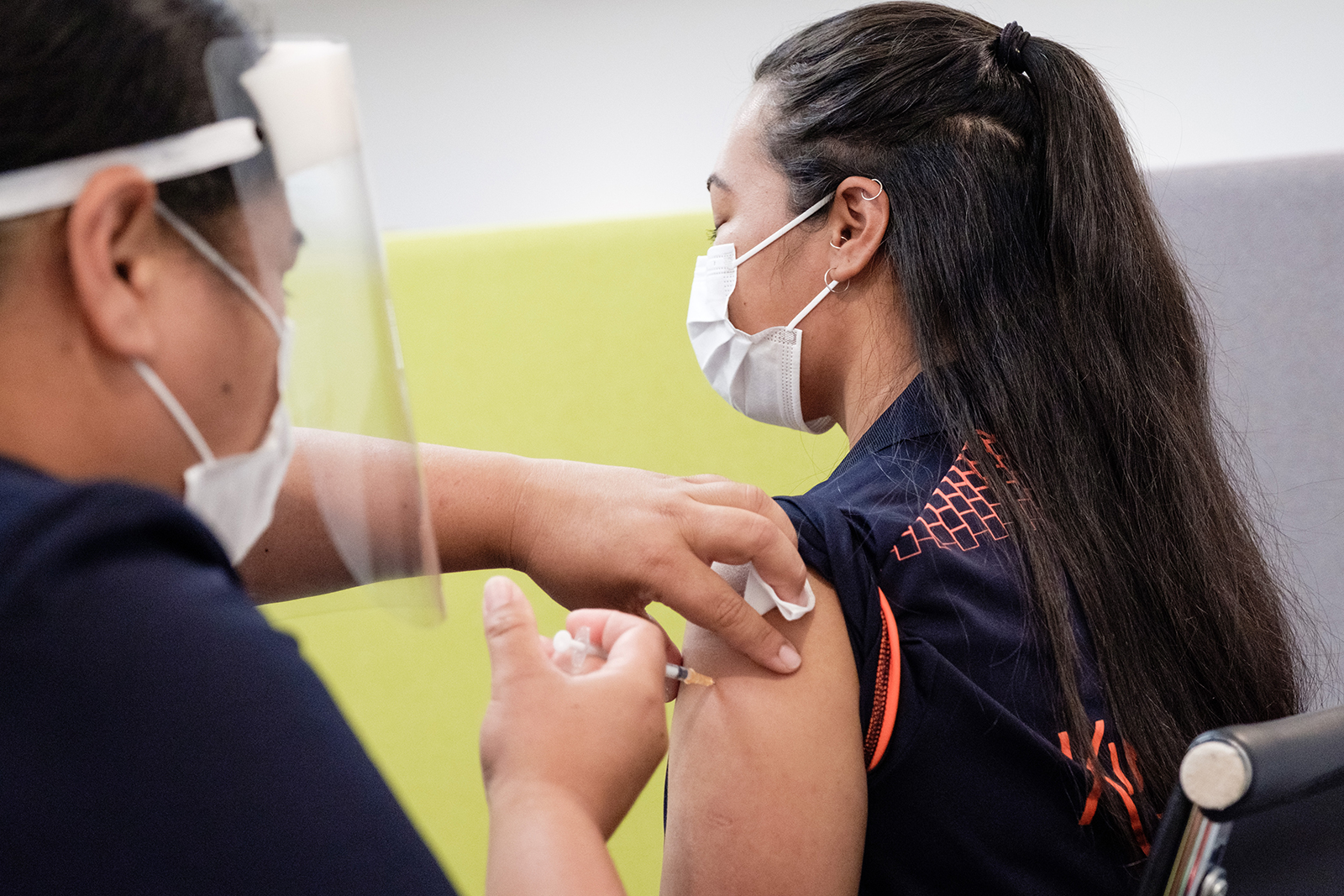  A border worker receives a dose of the Covid-19 vaccine in Auckland, New Zealand, on February 20.