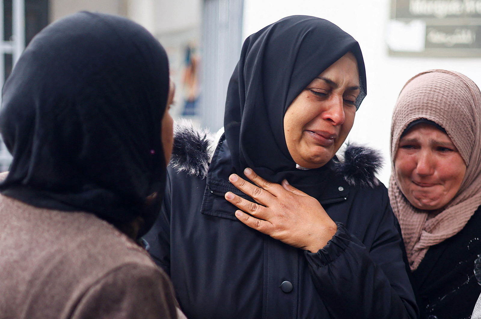Mourners react following the deaths of Palestinians in an Israeli strike in Rafah, Gaza, on March 26. 