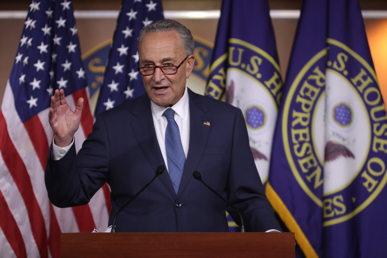 Senate Minority Leader Sen. Chuck Schumer participates in a news conference August 7 on Capitol Hill in Washington.