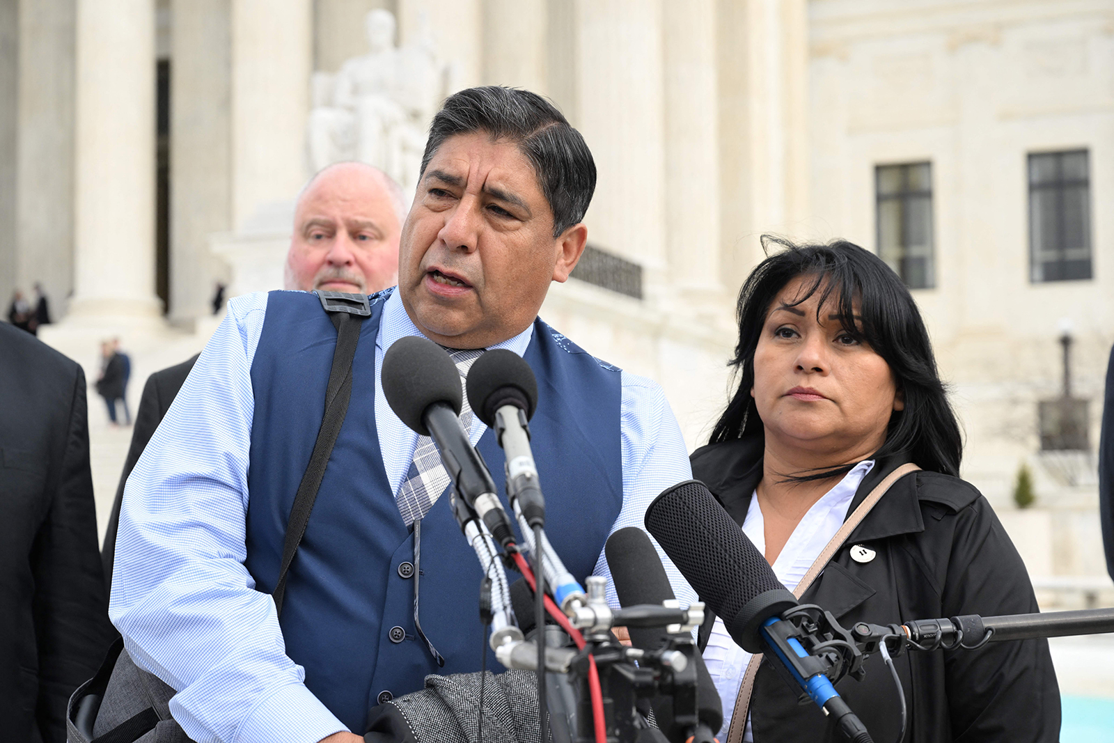 Beatriz Gonzalez and Jose Hernandez, the mother and stepfather of Nohemi Gonzalez, who died in a terrorist attack in Paris in 2015, speak to the media outside the US Supreme Court today following oral arguments in Gonzalez v. Google in Washington, DC.