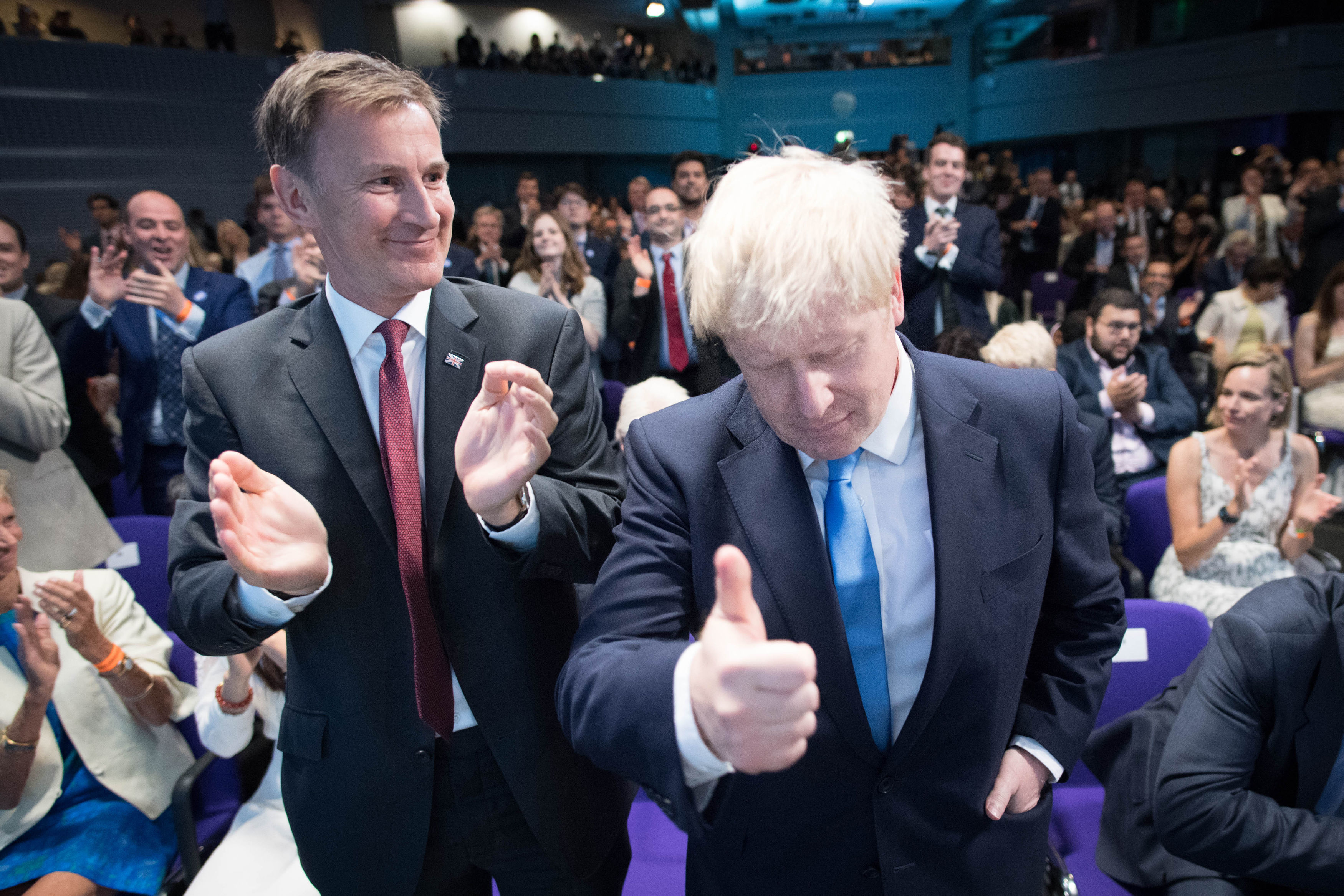 Hunt (left) and Johnson (right) after the result of the race was announced.