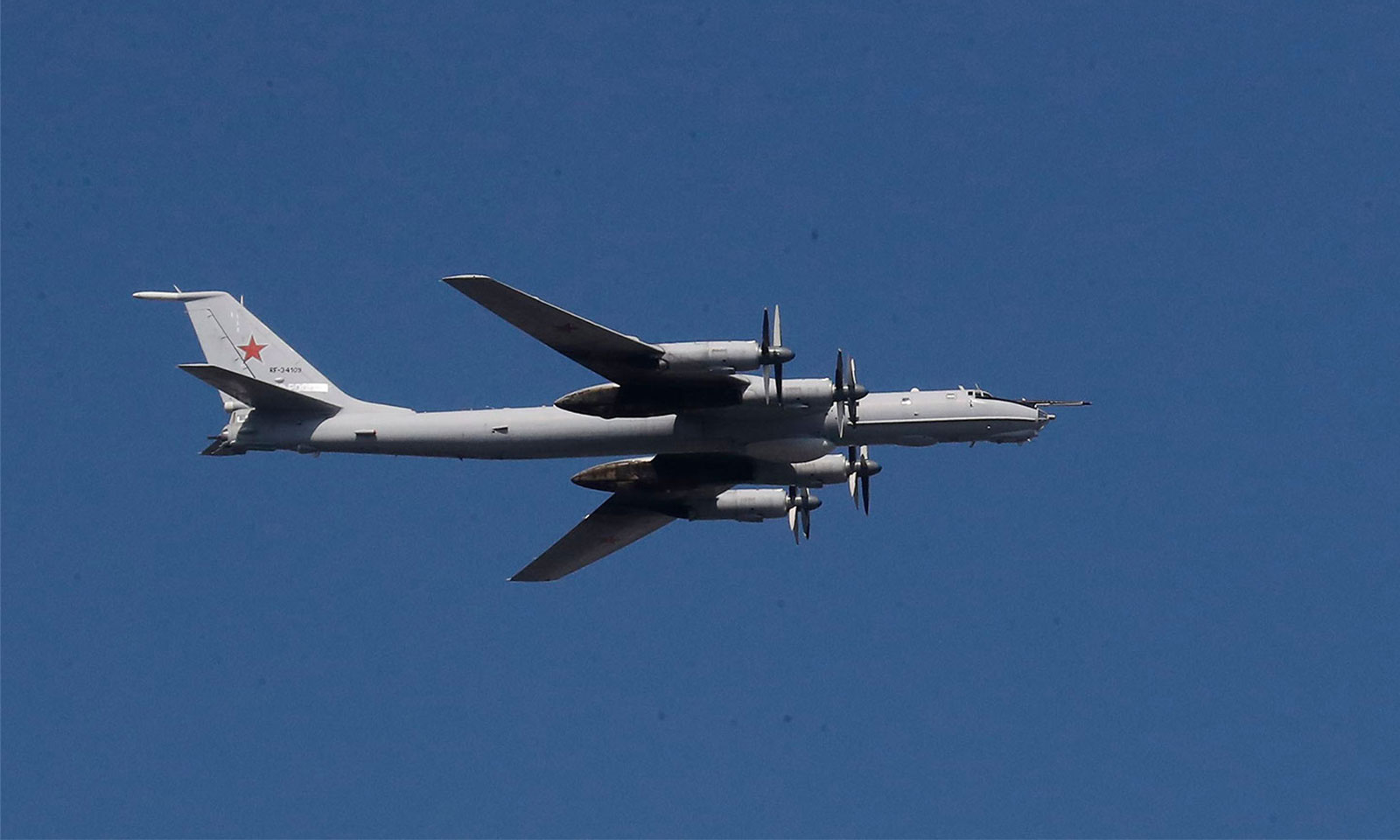 A Russian strategic bomber and missile platform TU-95 'Bear' flies past during a rehearsal for a 'Russia Navy Day' parade in St. Petersburg, Russia, in 2019. Two NORAD F-35s intercepted Russian TU-95 Bear bombers on Tuesday.