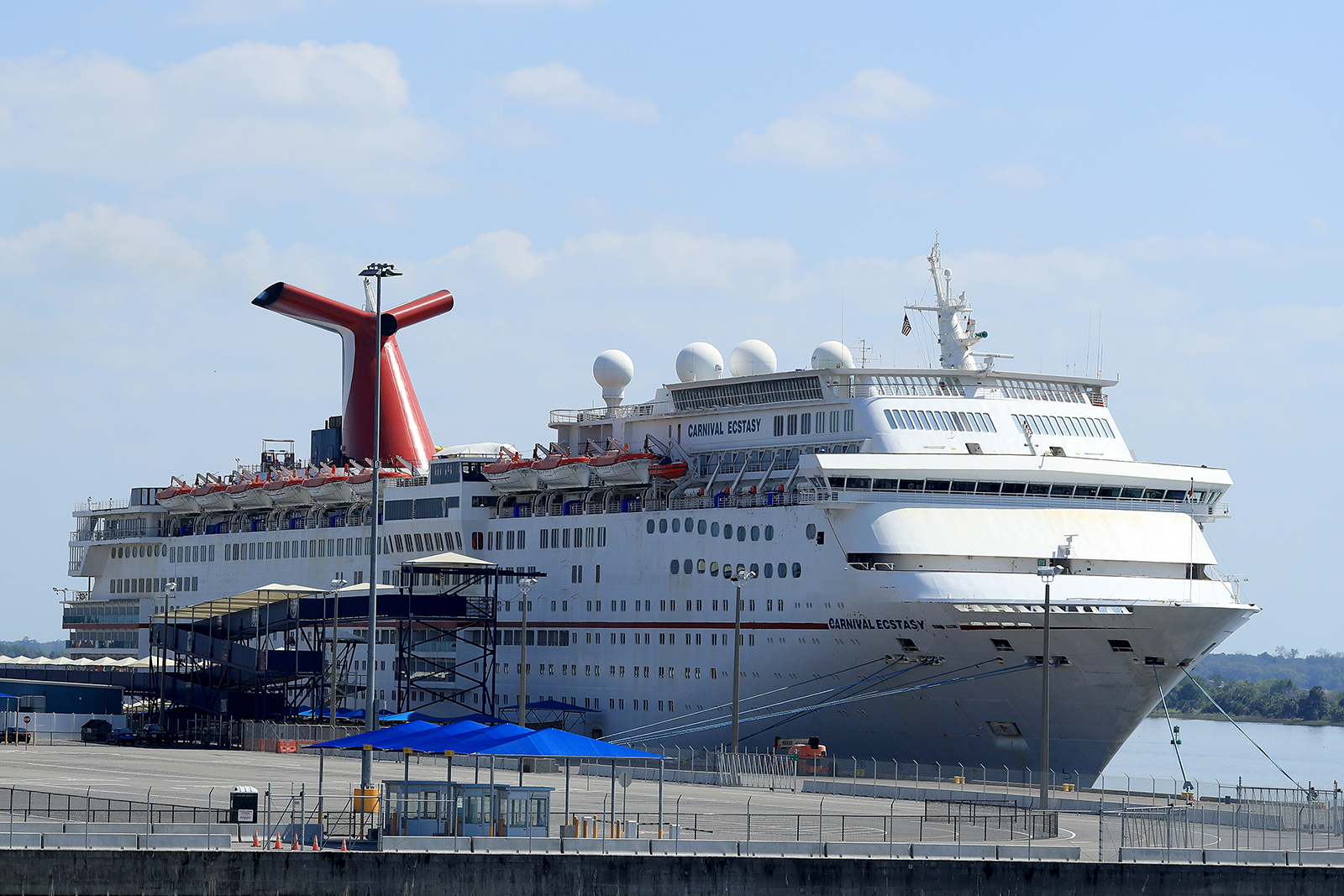 Carnival Cruise Line's Carnival Ecstacy cruise ship is docked at the Port of Jacksonville during the coronavirus outbreak on March 27 in Jacksonville, Florida.