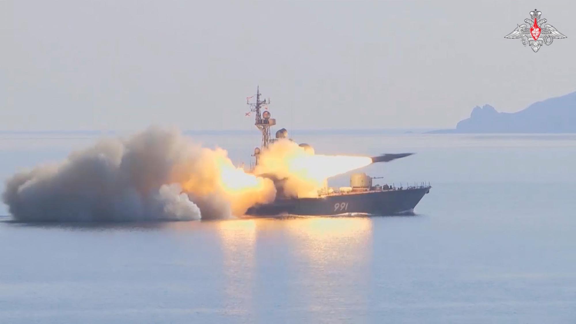 A still image from video released by Russia's Defense Ministry on March 28, shows what it said to be a missile ship of Russia's Pacific Fleet firing a Moskit cruise missile at a mock enemy sea target in waters off Japan's coast.