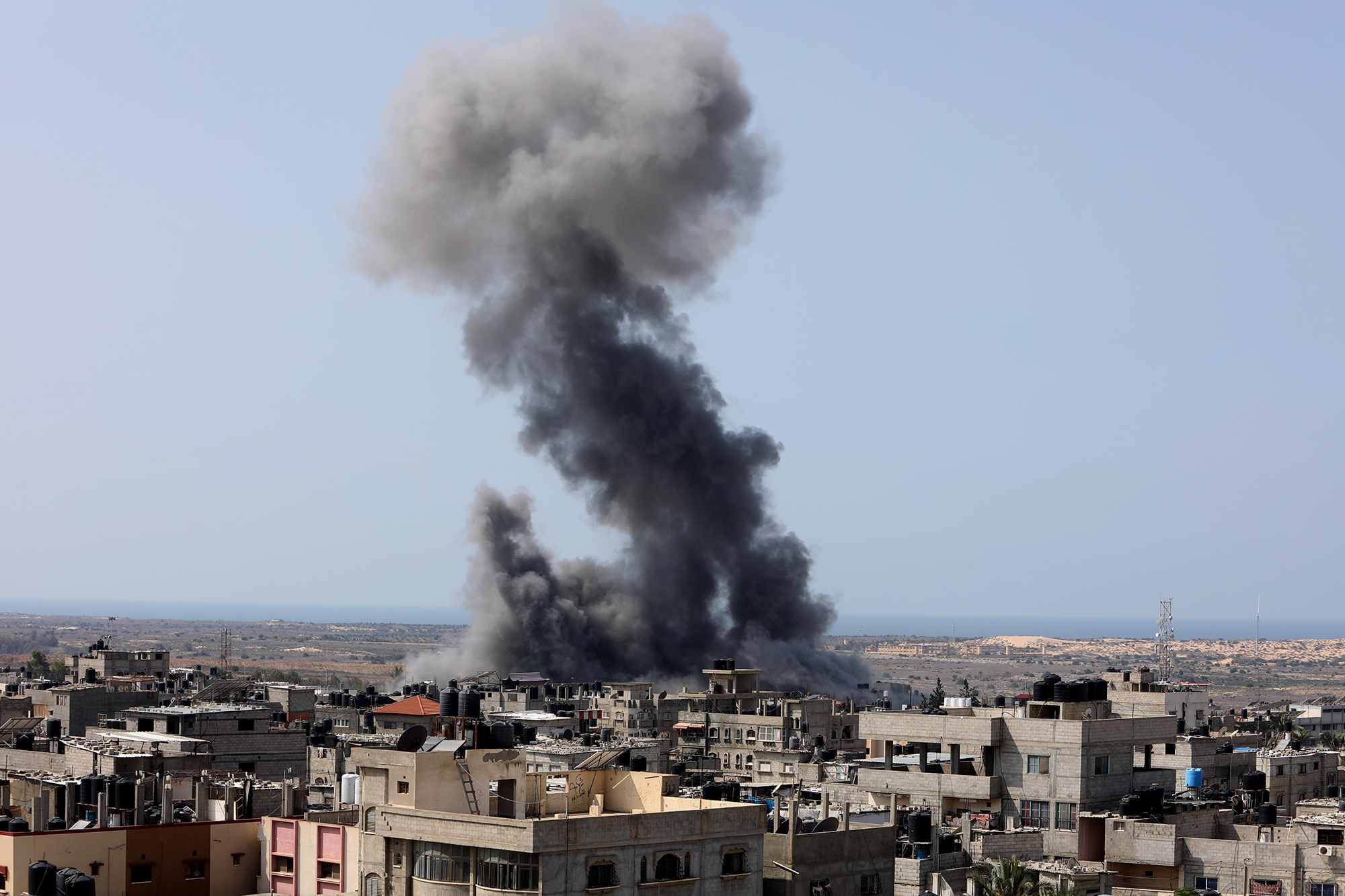 Smoke rises after Israeli airstrikes in Gaza on Sunday, October 8. 