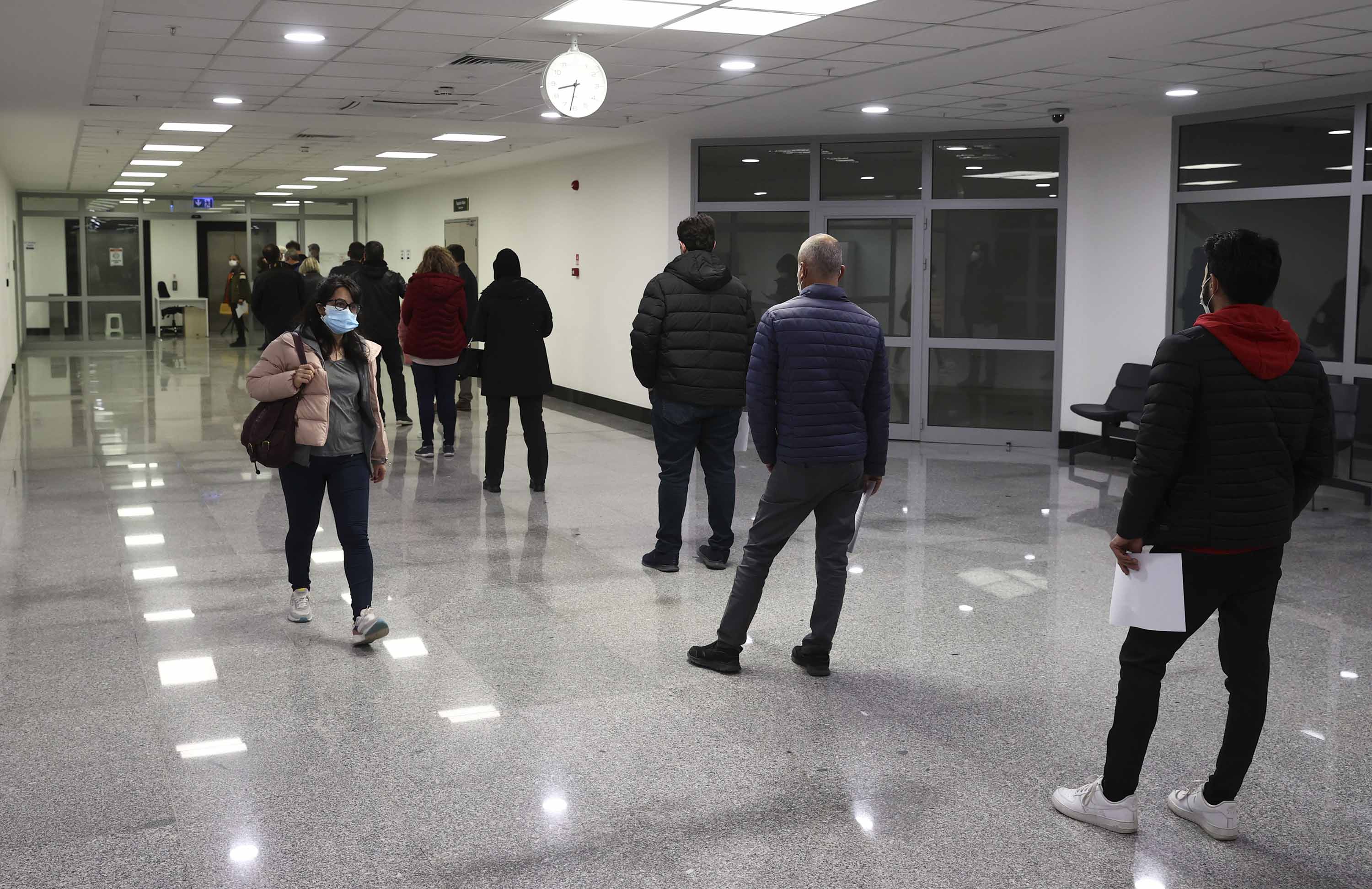 People wait in line to receive a dose of Covid-19 vaccine at Ankara City Hospital in Ankara, Turkey on April 14. 
