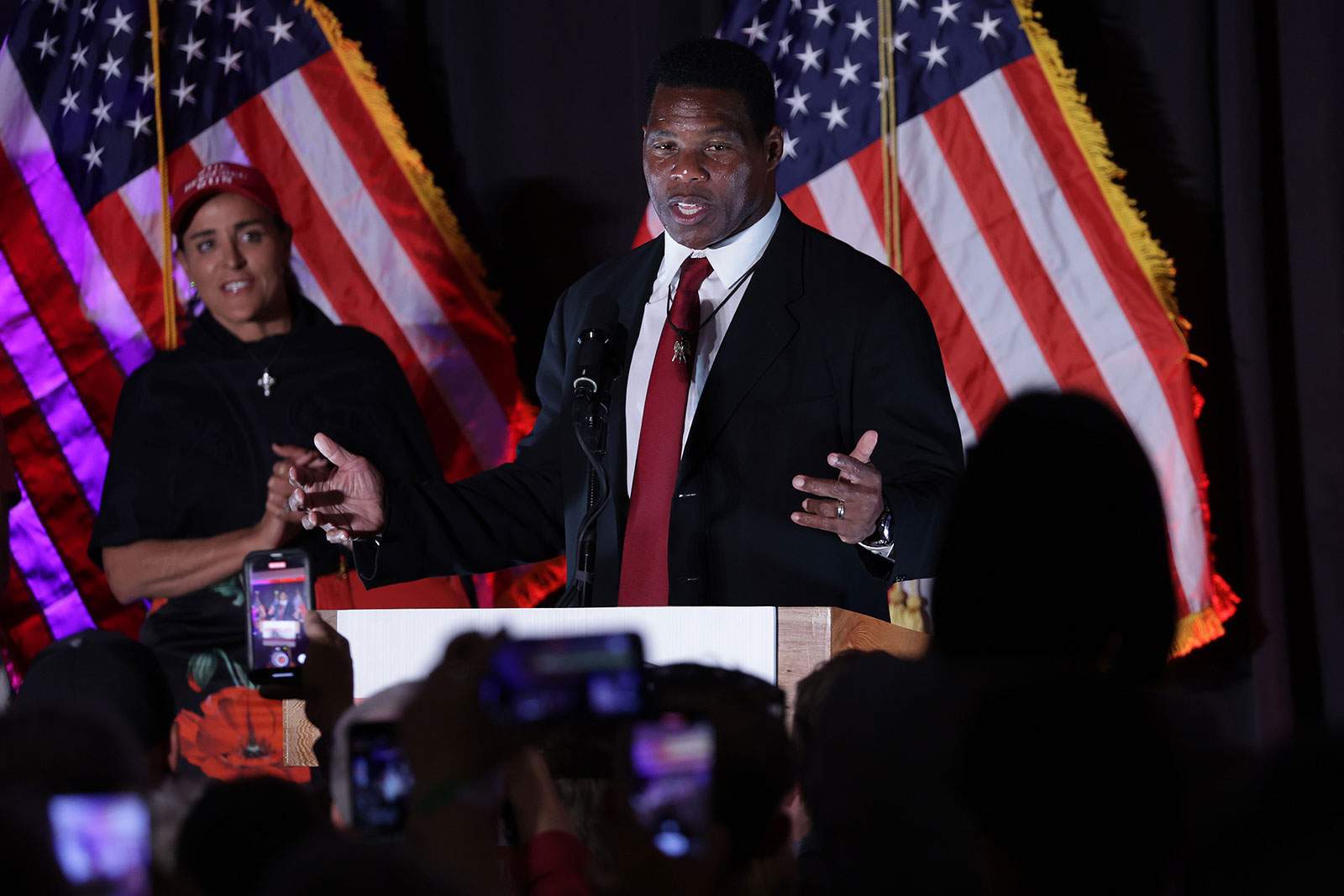 Herschel Walker speaks to supporters during an election night event in Atlanta on Tuesday.