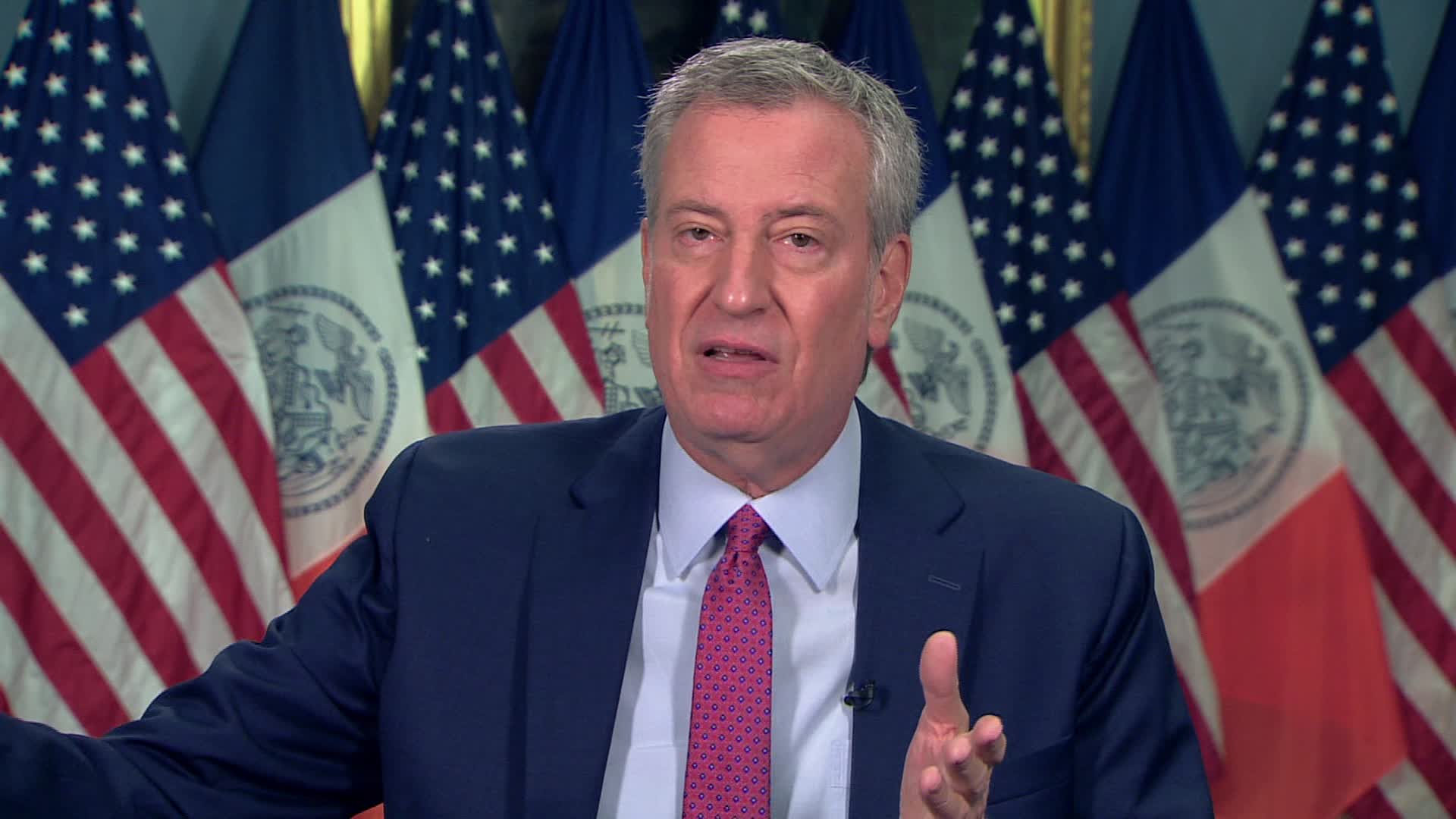 New York City Mayor Bill de Blasio speaks during an interview on November 30.