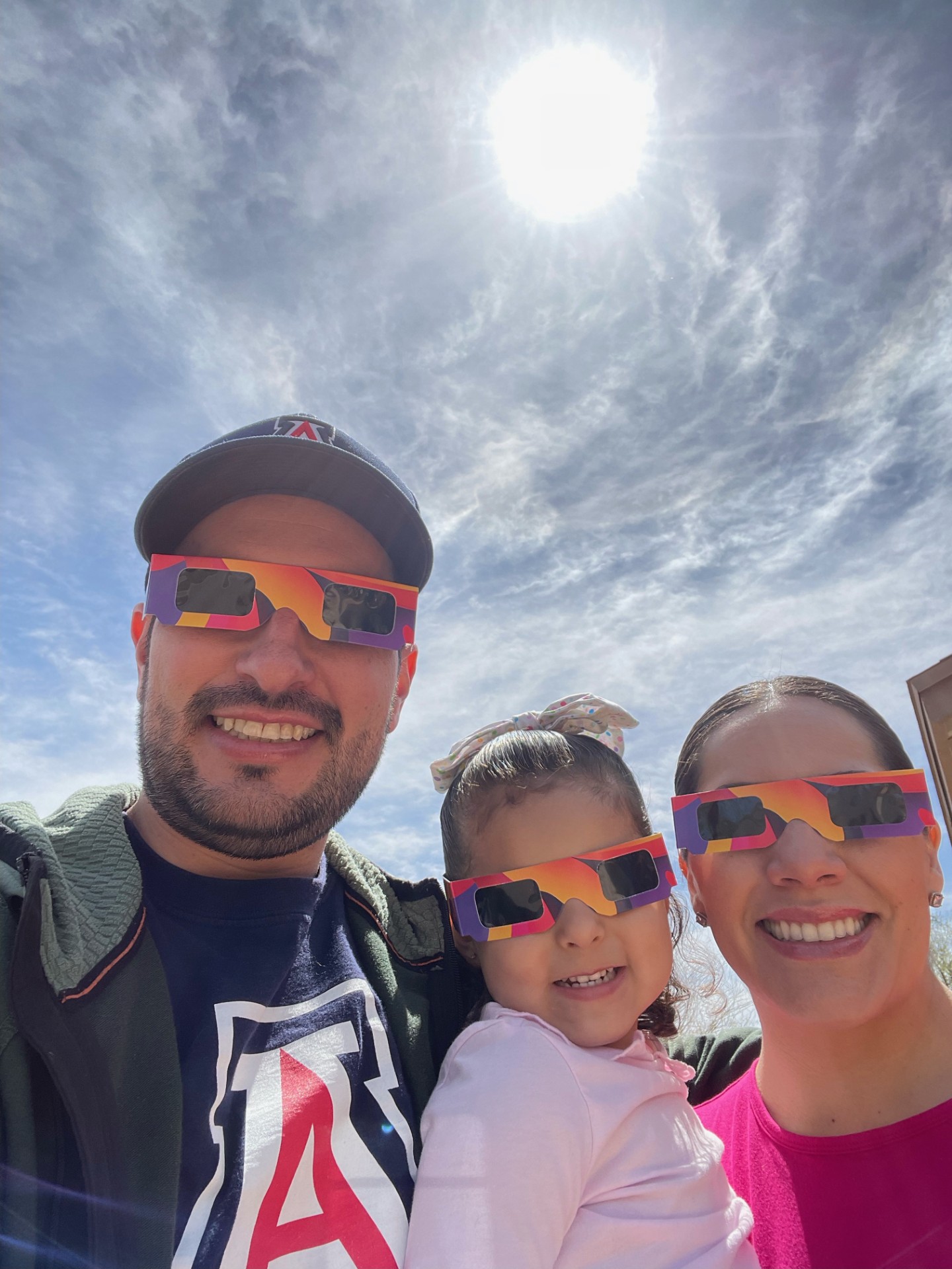 Juan M. Soto Peña, his wife Fabiola and daughter Luciana watch the eclipse from Tucson, Arizona.