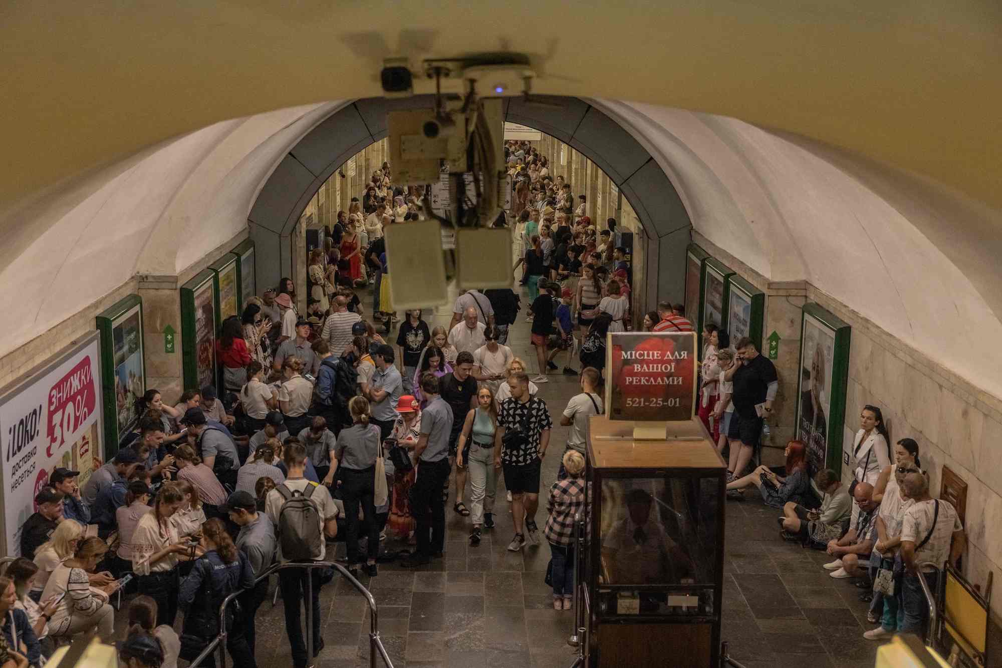 People take shelter in a metro station during an air raid alert in Kyiv on August 24.