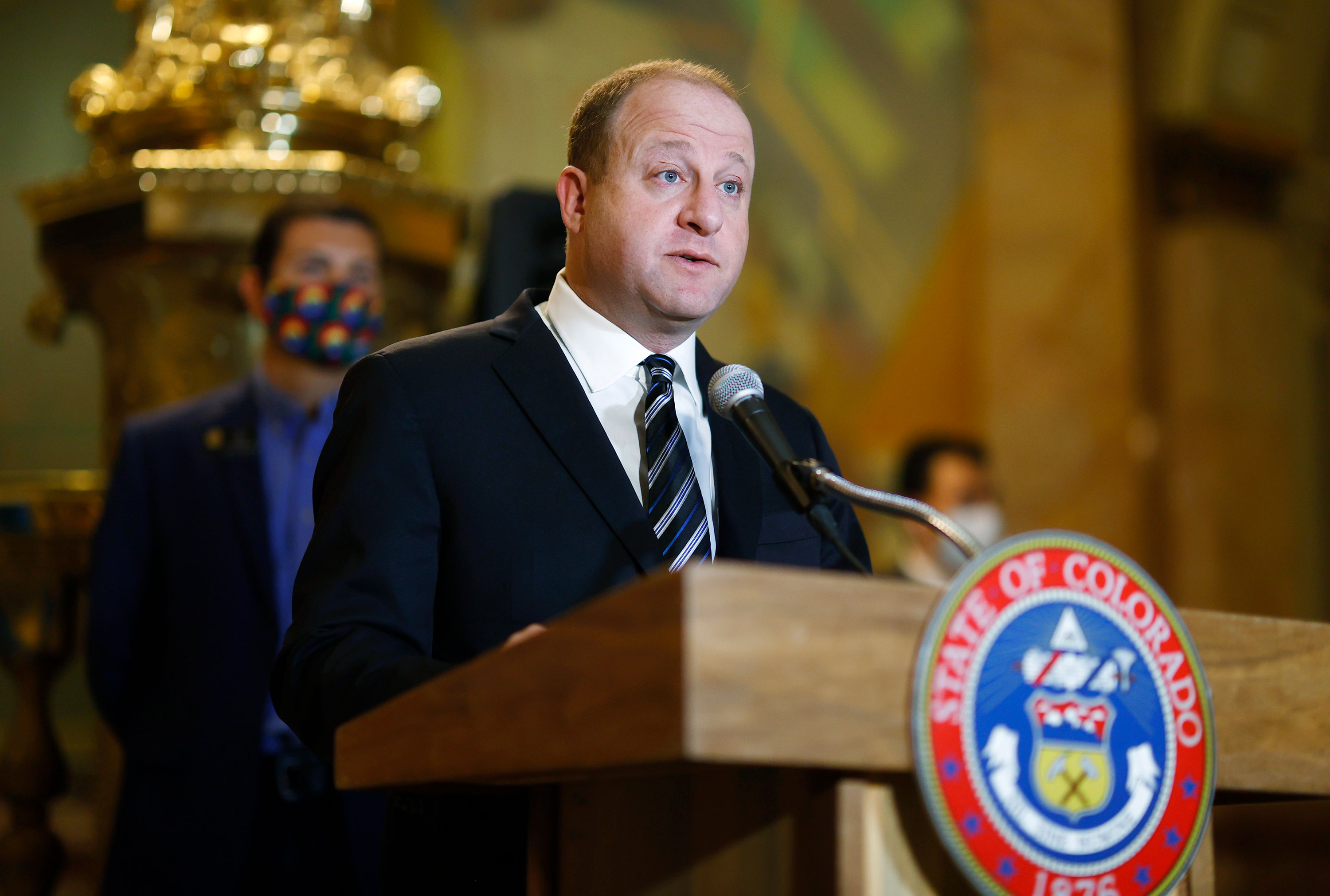 Colorado Gov. Jared Polis speaks before signing a police accountability bill on Friday, June 19 in Denver. 