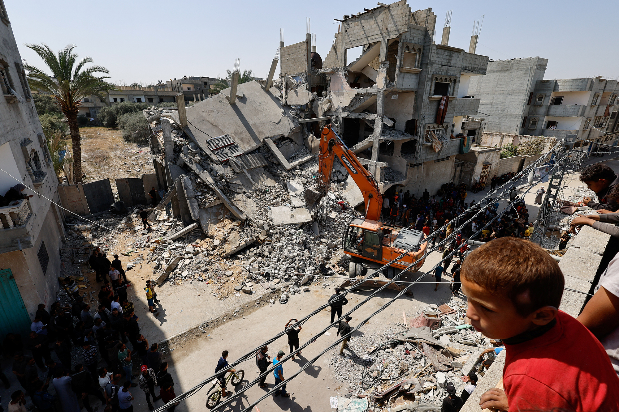 Palestinians inspect the site of an Israeli airstrike in Rafah, Gaza, on April 2. 