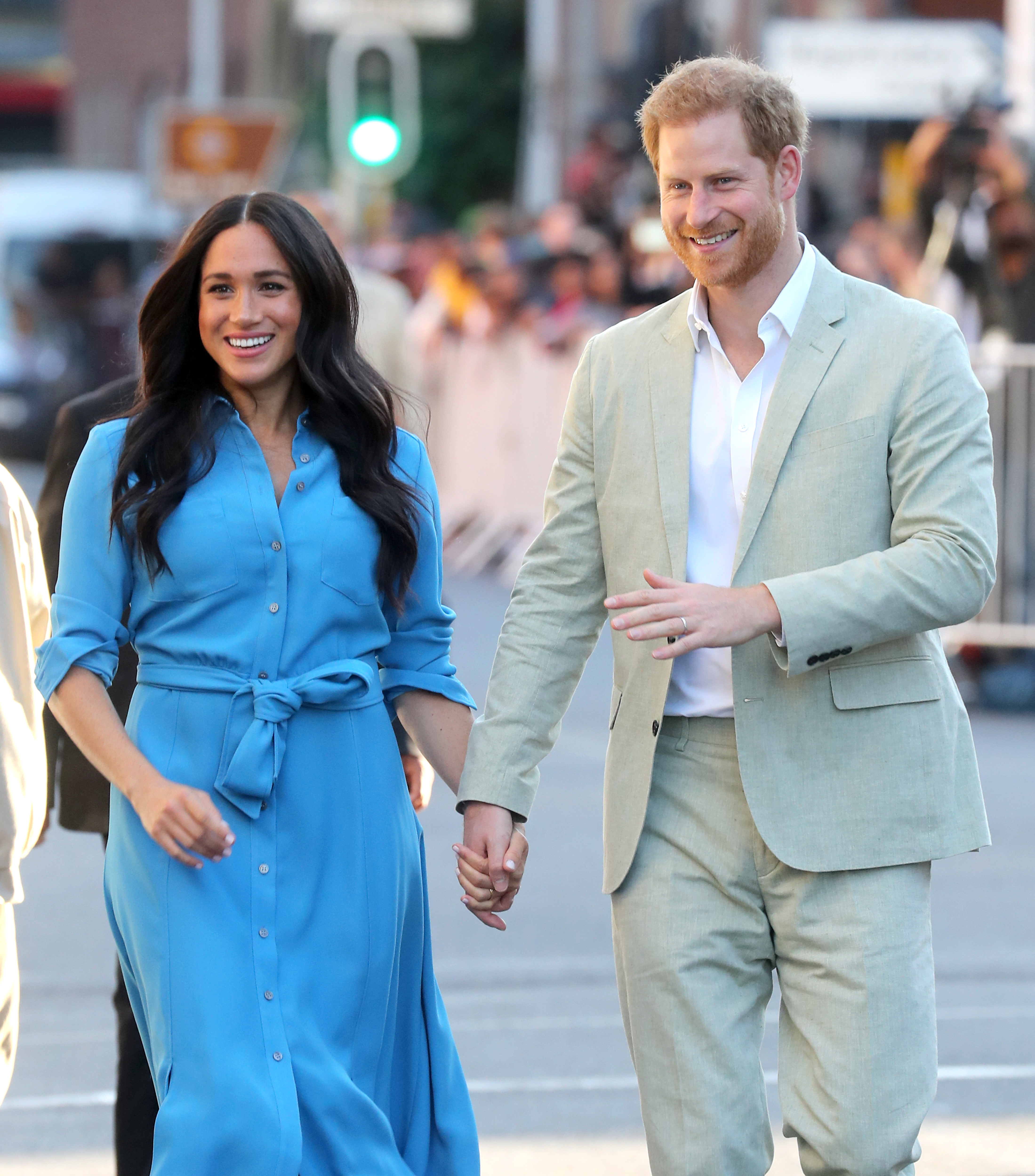 Meghan donned a blue Veronica Beard dress for the couple's visit to District Six earlier this week. She previously wore the outfit during the couple's Commonwealth tour to Tonga last fall. Chris Jackson/Getty Images