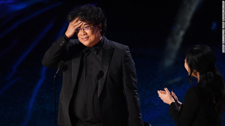 Bong Joon Ho accepts the award for achievement in directing for "Parasite."
