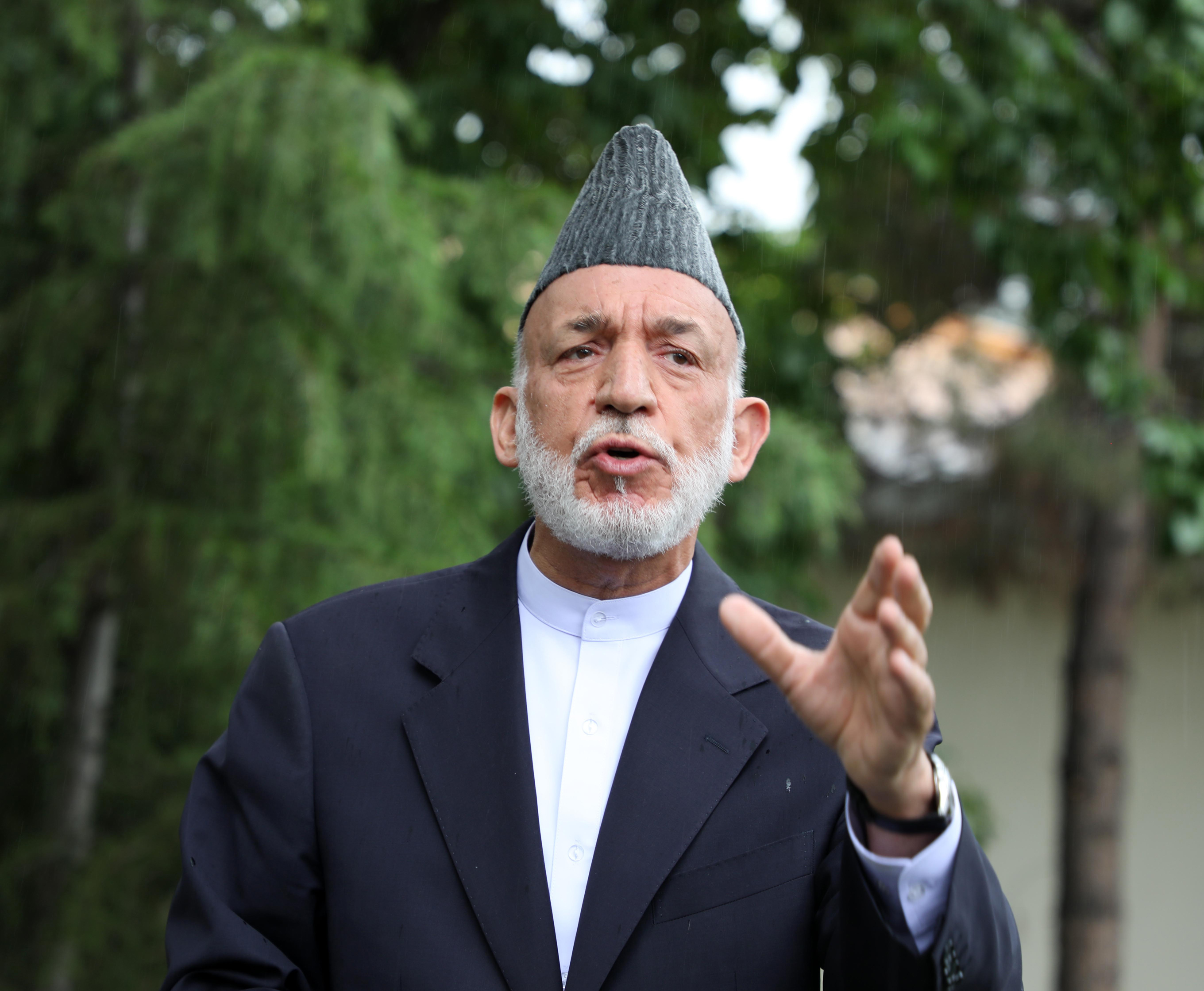 Former President of Afghanistan Hamid Karzai speaks during a press conference in Kabul, on July 13.