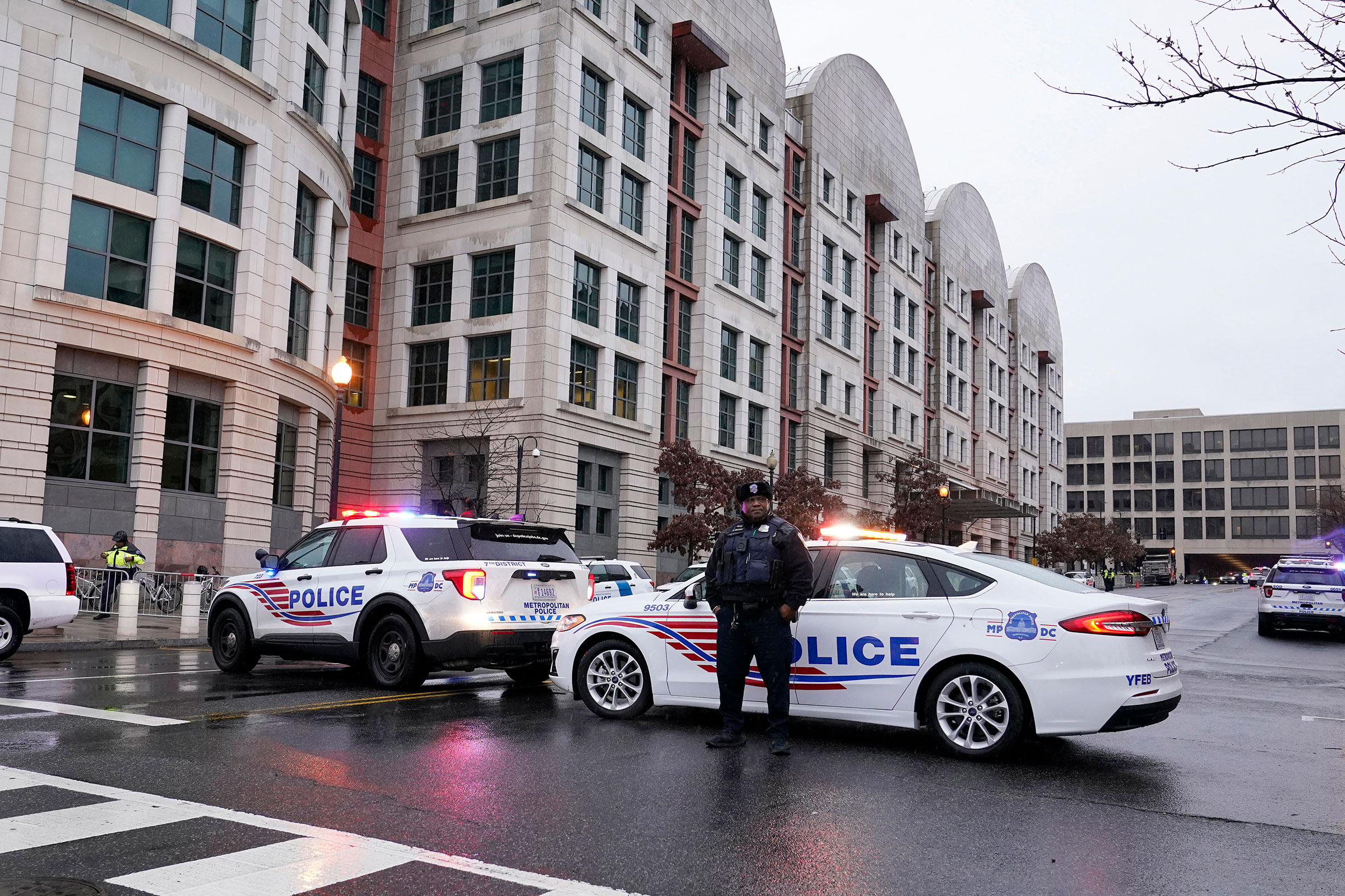 Police stand guard at federal court house in Washington, DC, on Tuesday, January 9.