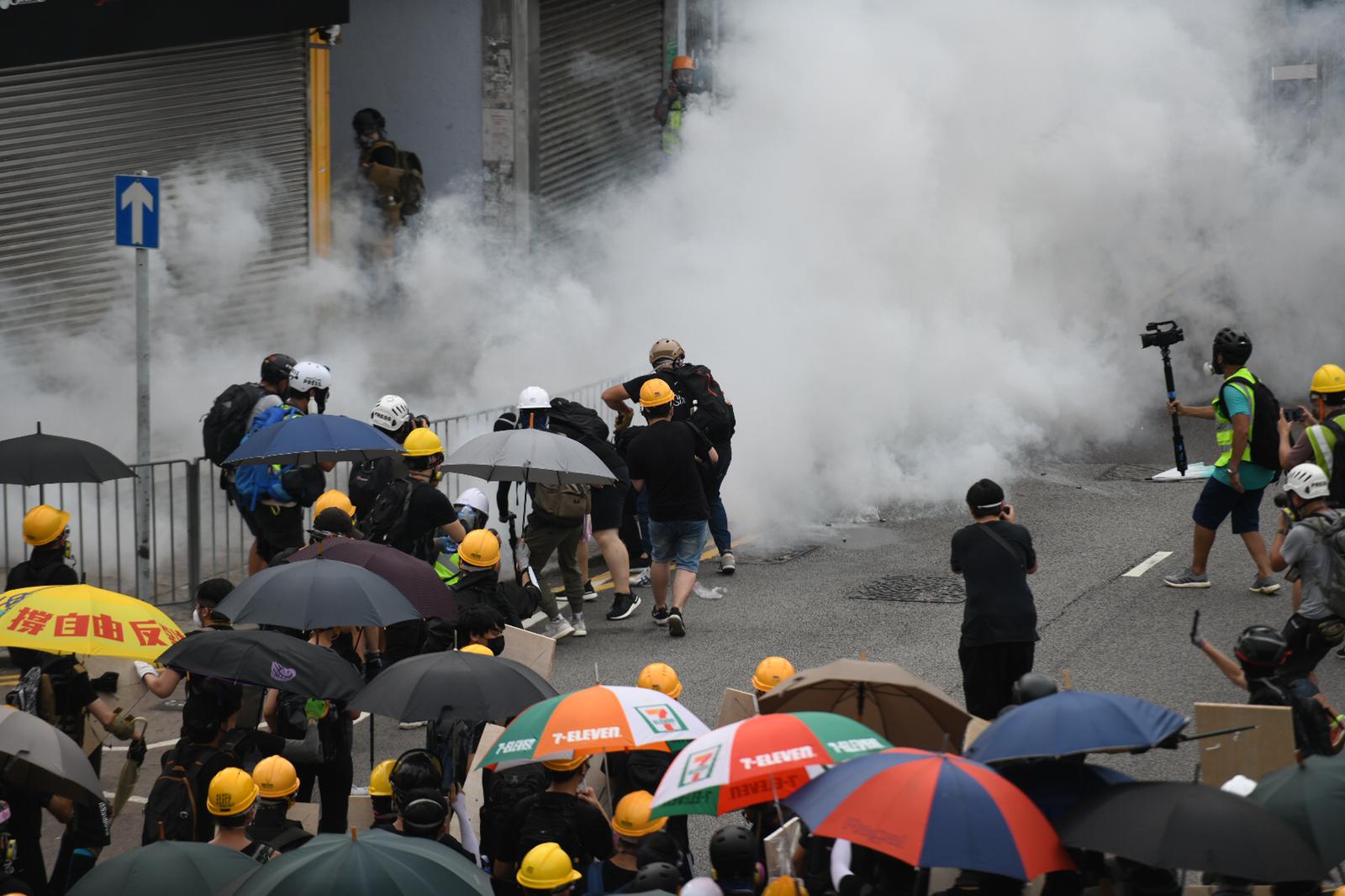 Tear gas deployed against protesters in Yuen Long following a march on Saturday.