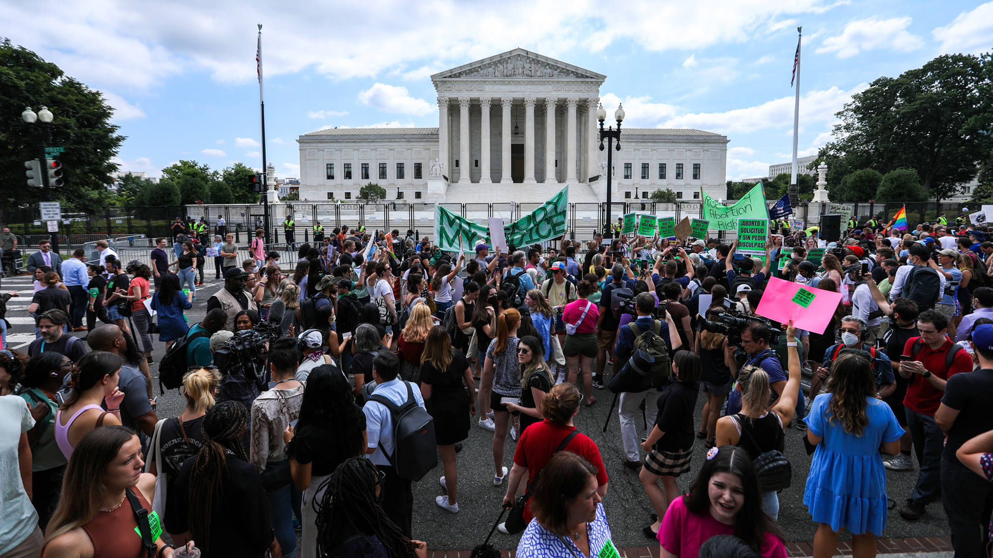 Abortion rights demonstrators hold signs outside the Supreme Court in Washington, DC on June 24. 