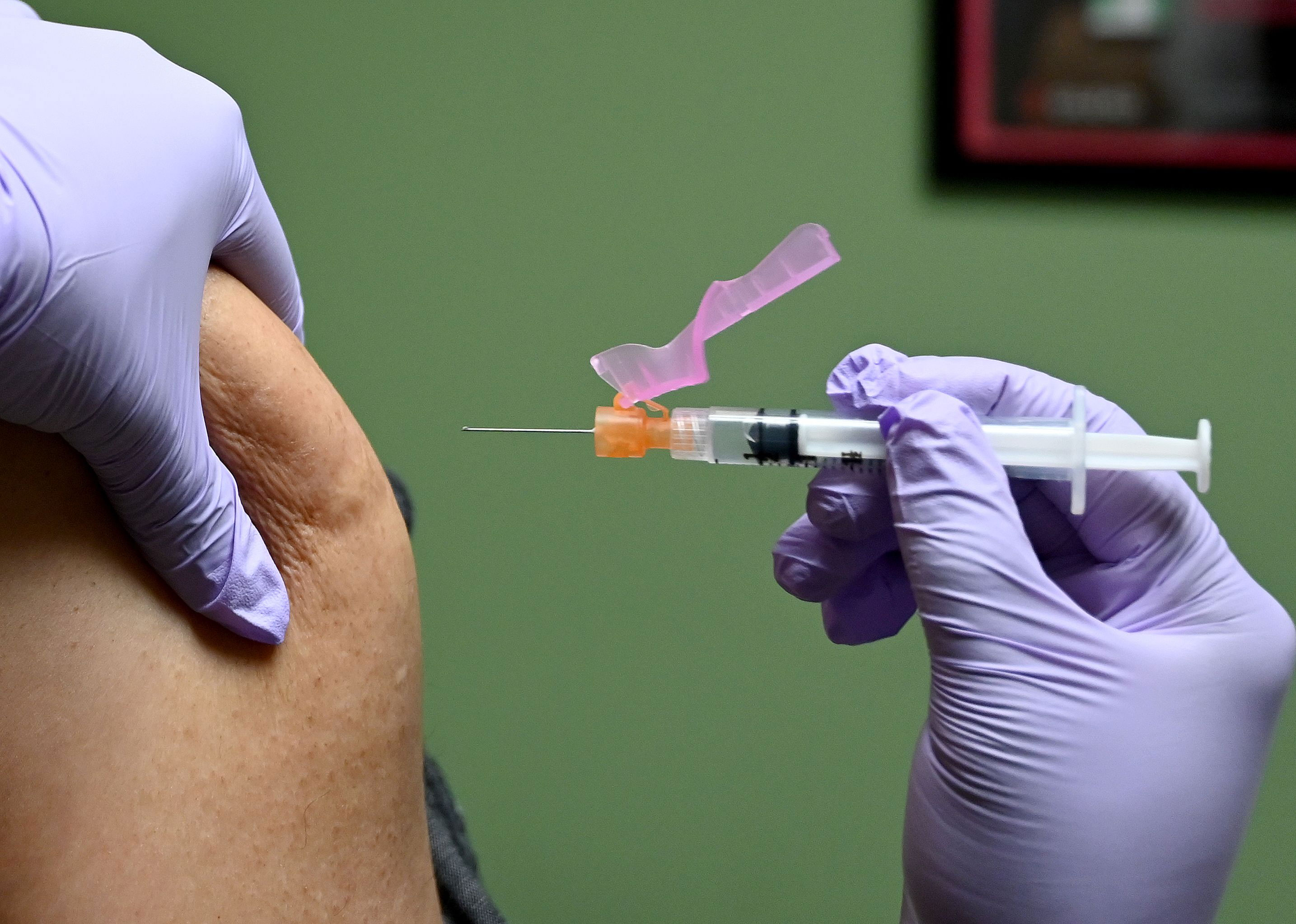 A man gets a flu shot at a health facility in Washington on January 31.