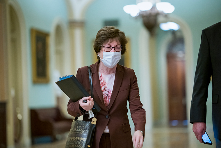 Sen. Susan Collins, R-Maine, leaves the Senate chamber at the Capitol in Washington, Friday, Jan. 22, 2021.