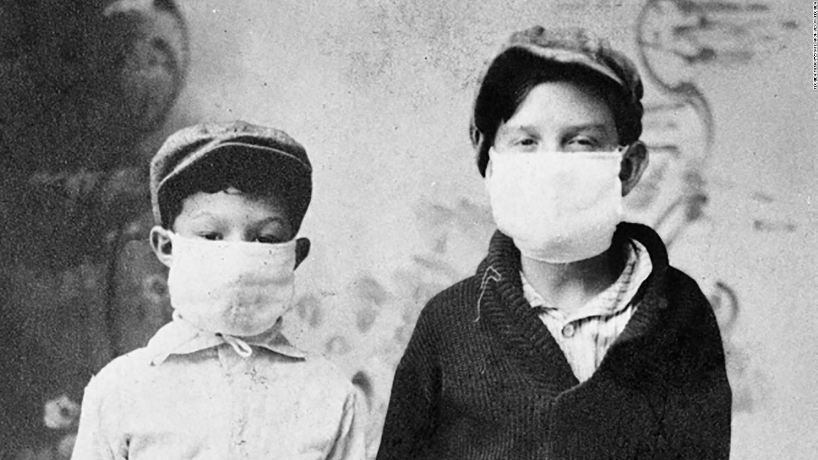 Youngsters Don Hoover and Joe Sistrunk of Starke, Florida are pictured wearing face coverings, ready for school, during the 1918 Spanish flu epidemic.