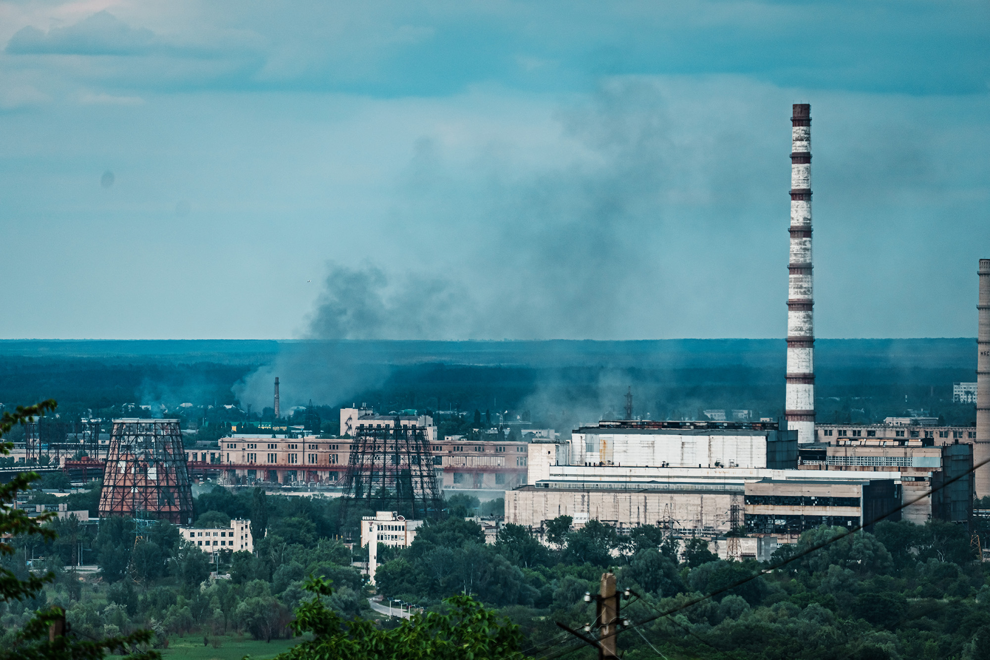 Columns of smoke rise from different parts of Severodonetsk, as seen from Lysychansk, Ukraine, on June 5.