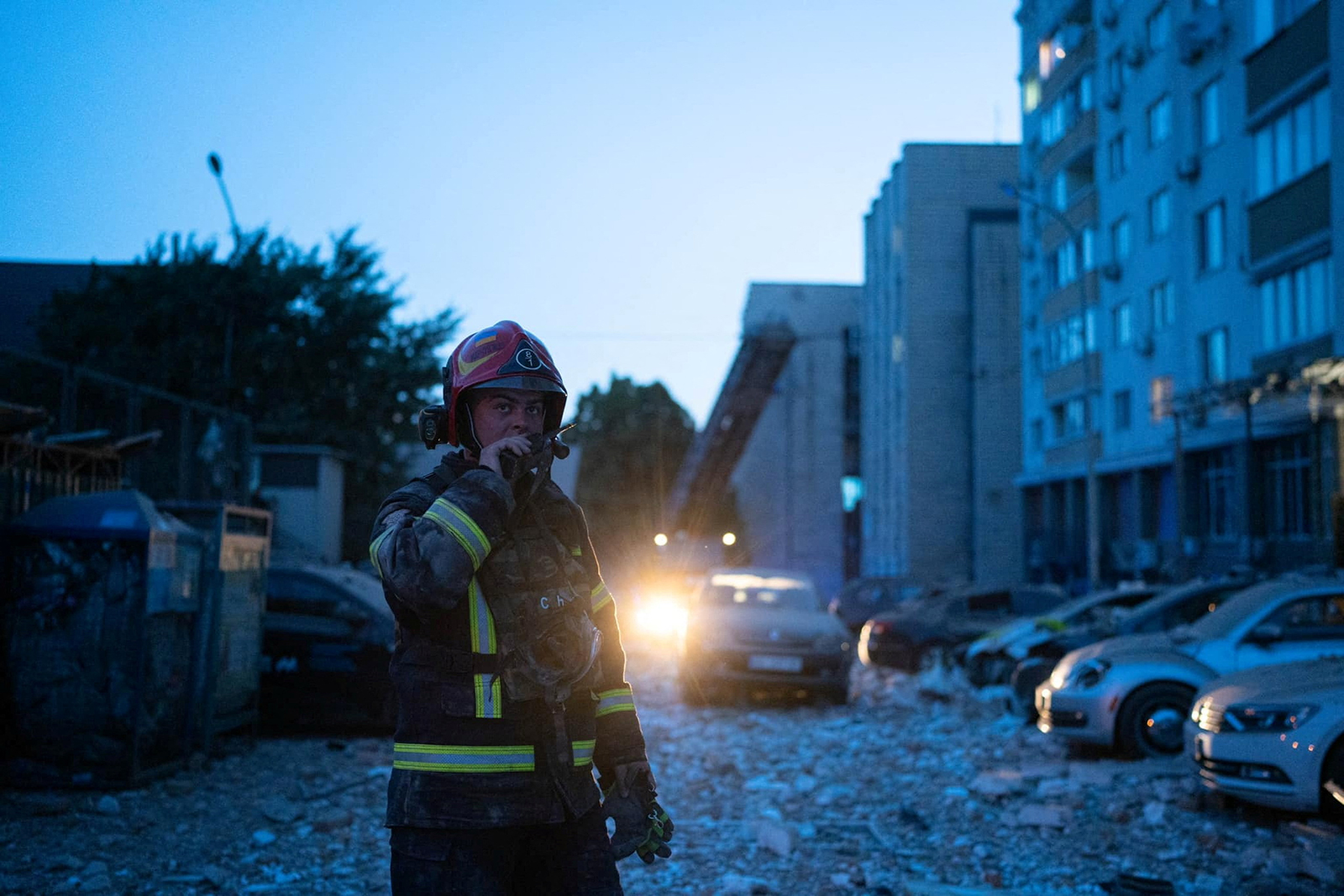 A rescuer works at the area where an apartment building has been damaged during a massive Russian drone strike, in Kyiv, Ukraine on May 30.